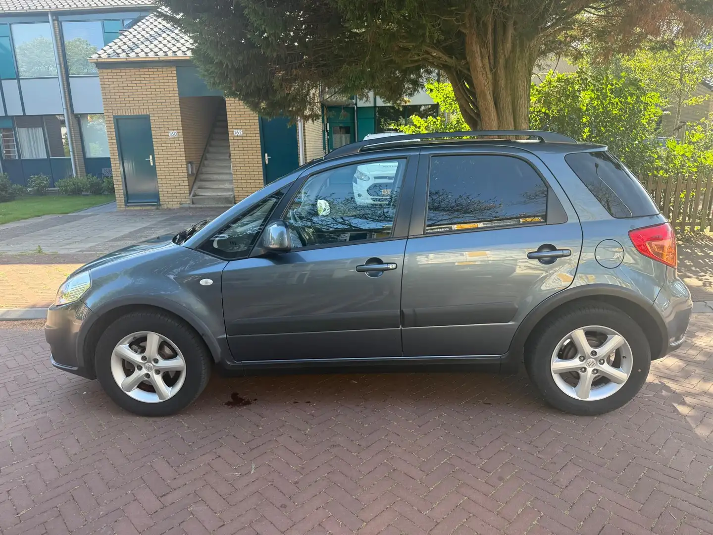 Suzuki SX4 AUTOMAAT / Eerste eigenaar / 106.000 NAP / Mooie a Grijs - 2