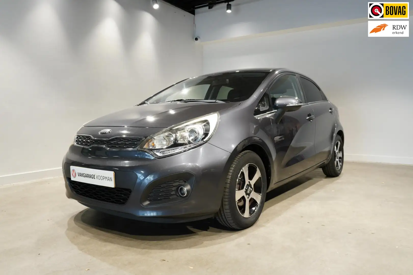 Kia Rio 1.2 CVVT Design Edition PDC, Airco, Start&Stop Grau - 1