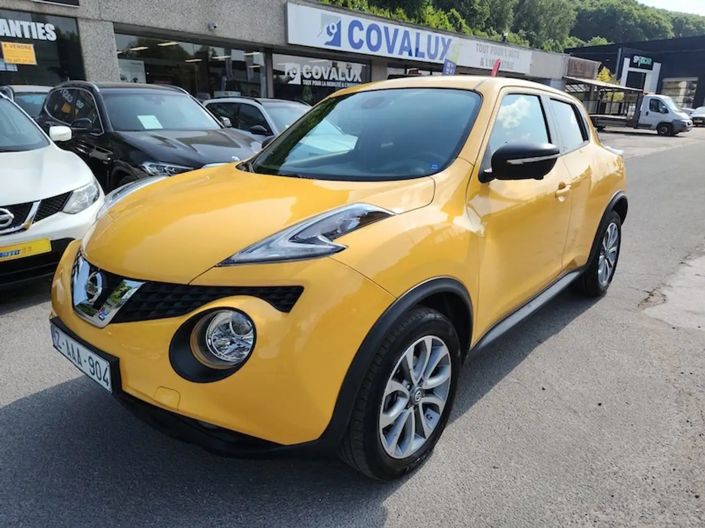 Nissan Juke 1.2 DIG-T 2WD Tekna Jaune - 1