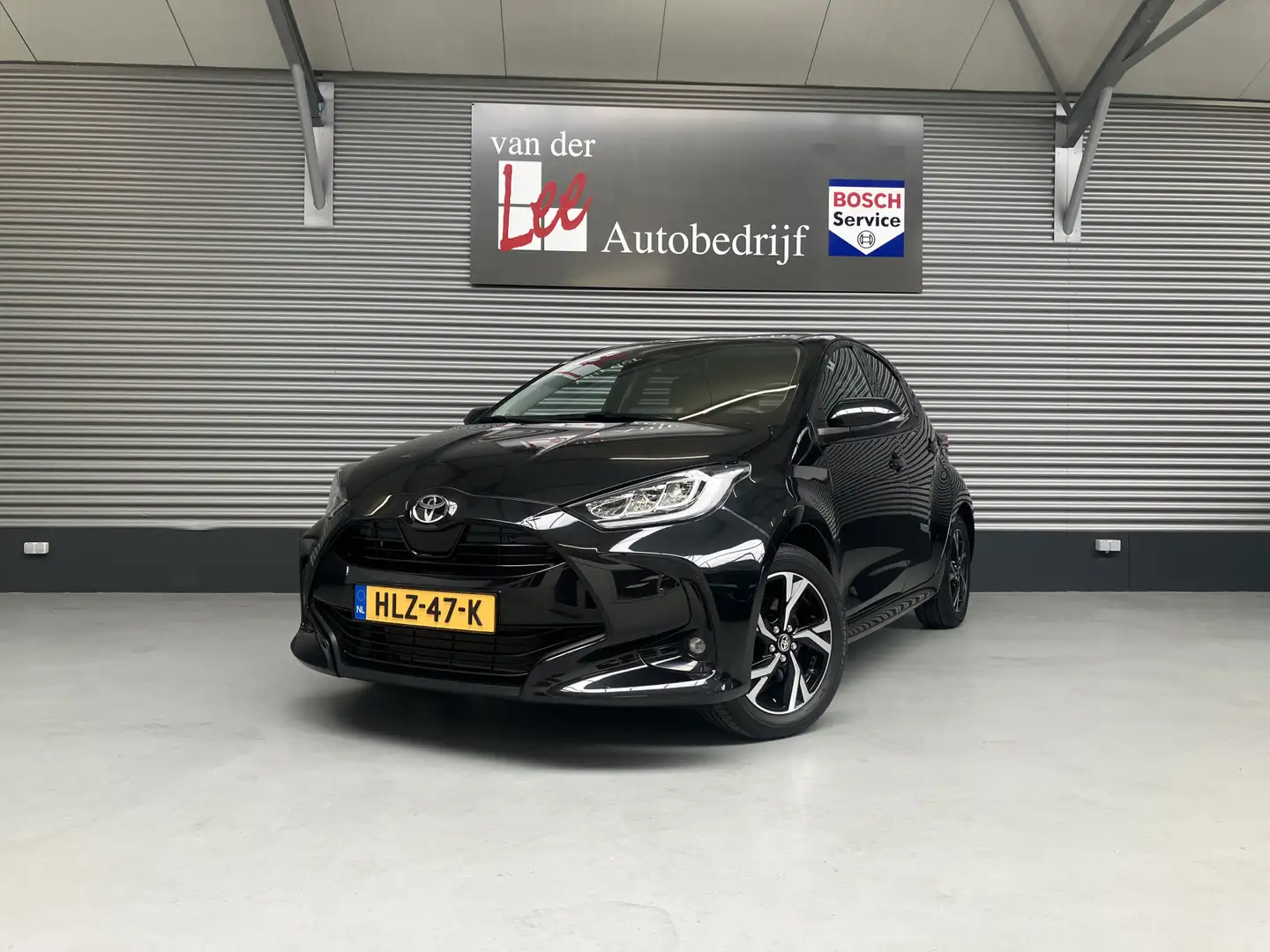 Toyota Yaris 1.5 Hybrid 115 STYLE/PDC V+A/CAM/DODEHOEK/CLIMA/EN Zwart - 1