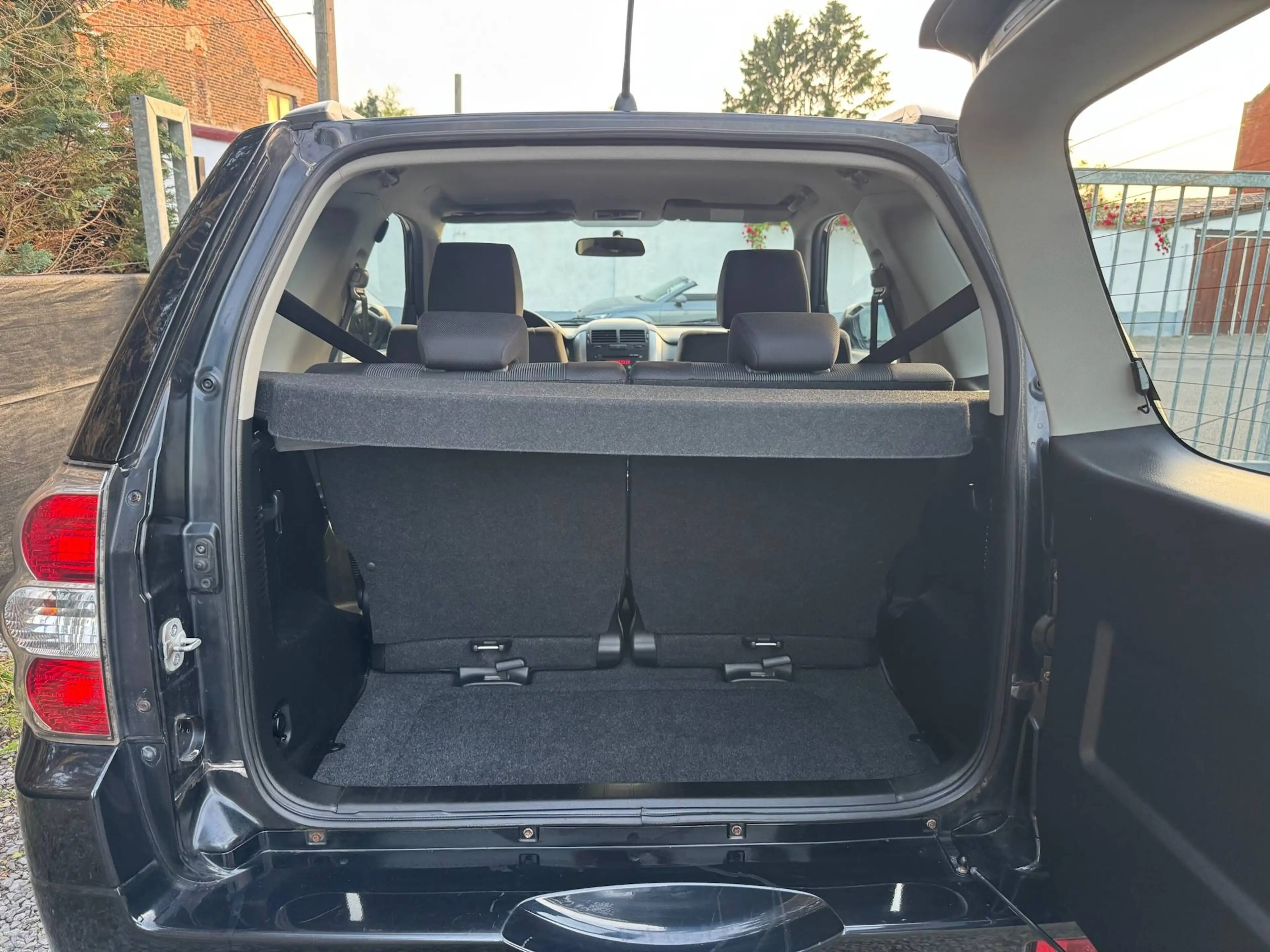 Suzuki Grand Vitara 1.6i 4WD Etat neuf/Clim/Jantes/Gar 12 Mois — photo 8