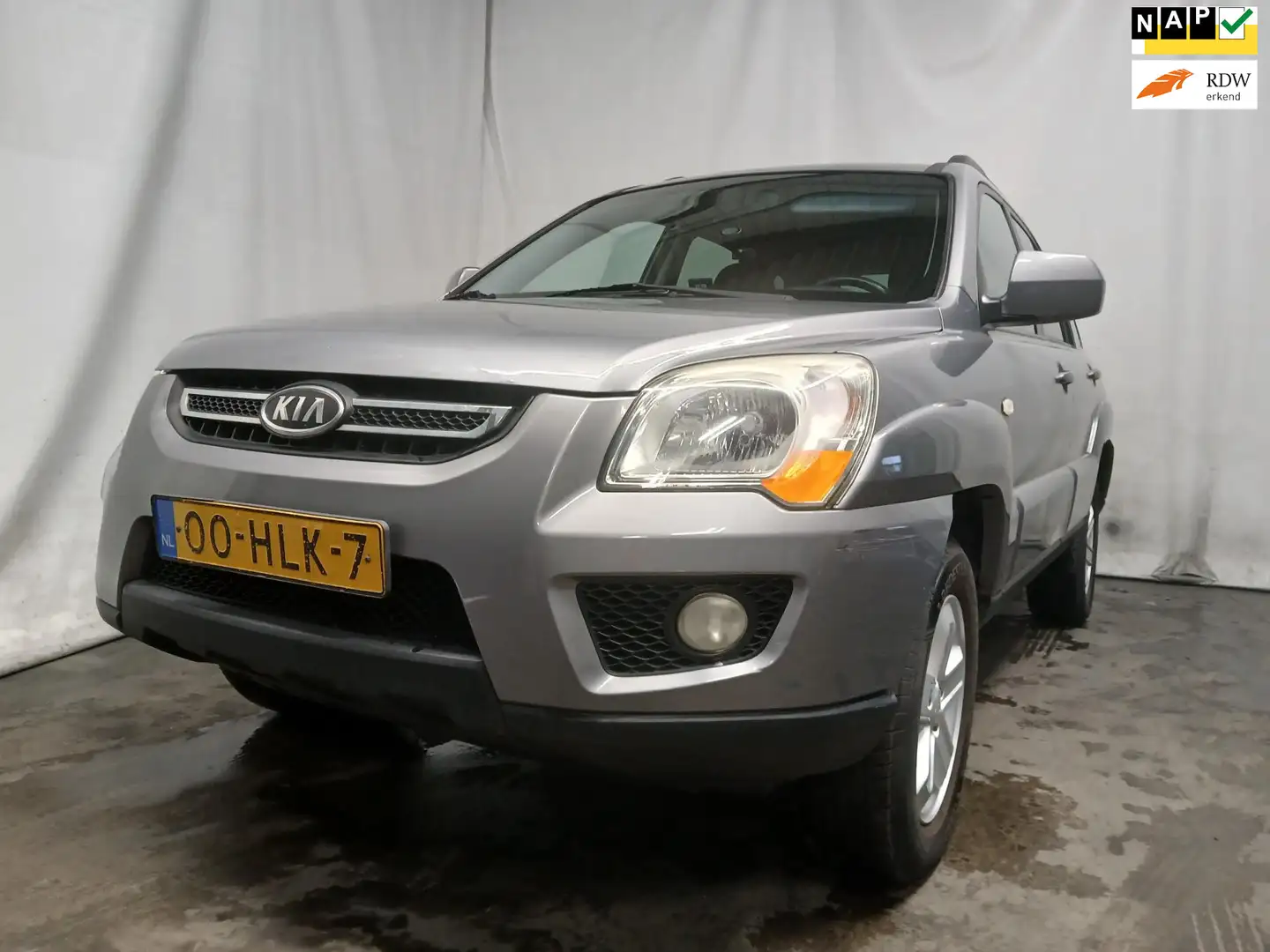 Kia Sportage 2.0 CVVT X-tra SCHADEAUTO!! Gris - 1