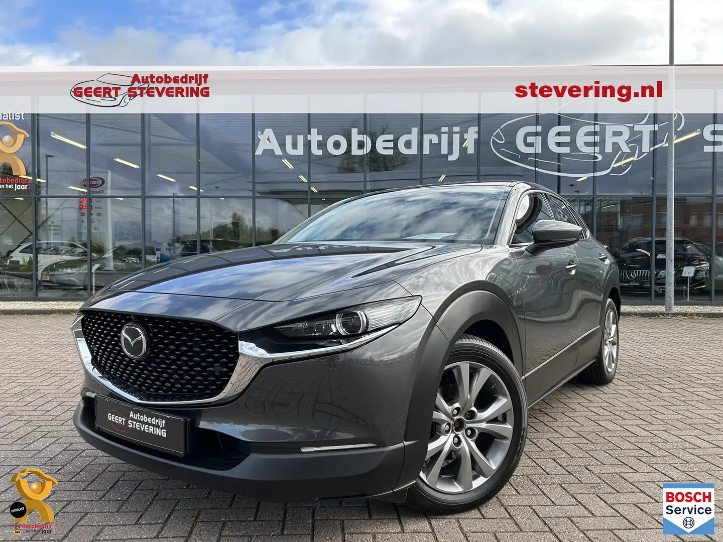 Mazda CX-30 2.0 e-SkyActiv-G M Hybrid Luxury / Bose / Leder / Grijs - 1