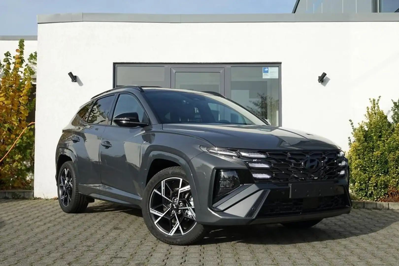 Hyundai TUCSON N-Line 150PS DCT PanoGlasSchiebedach +AHK Grau - 1
