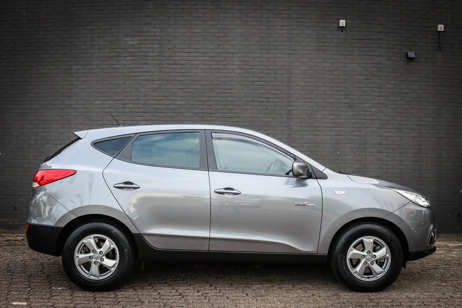 Hyundai iX35 1.6i GDI Dynamic Ned auto/Airco/Trekhaak Grijs - 2