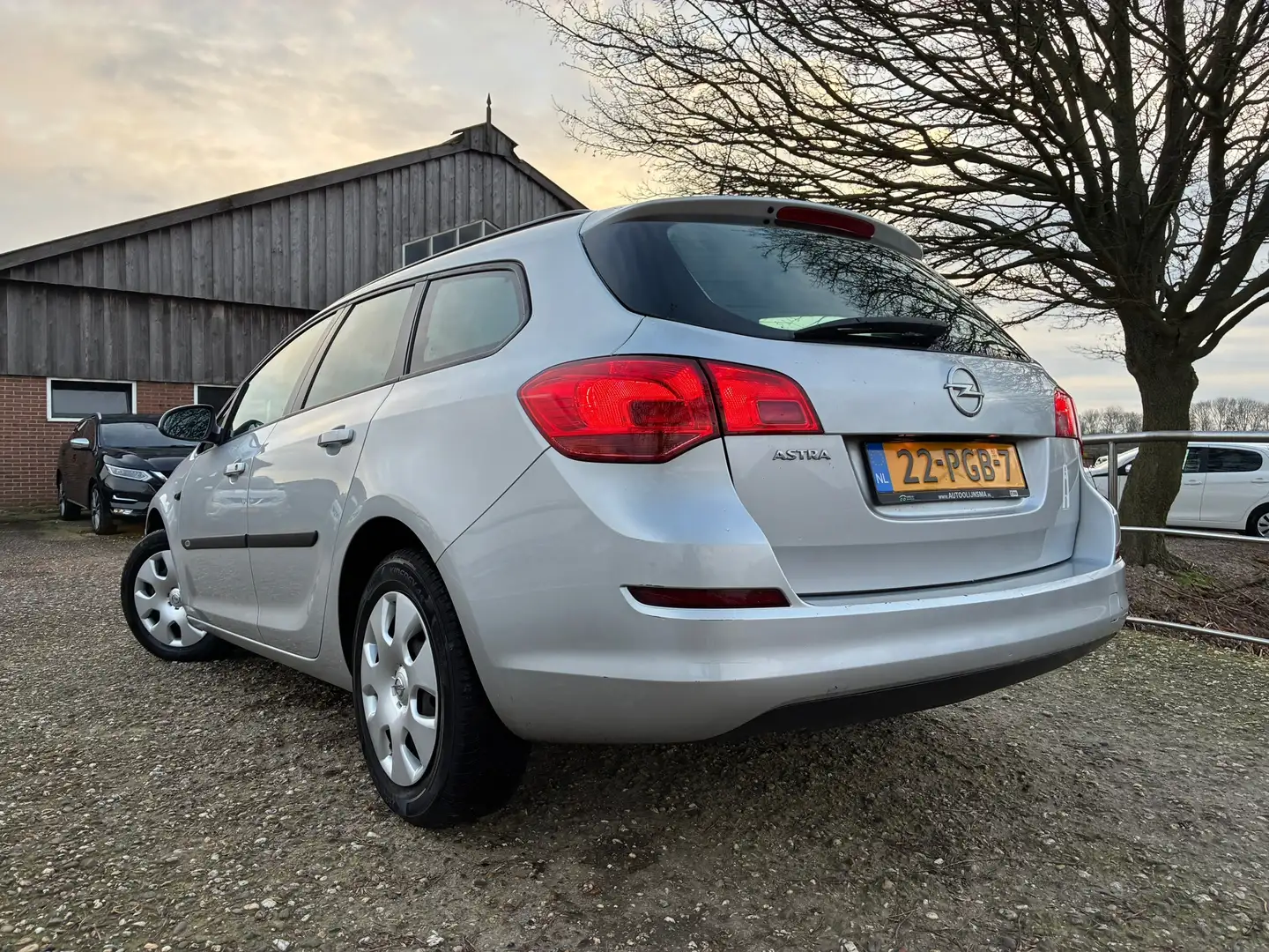 Opel Astra Sports Tourer 1.4 Selection | Cruise Nu € 1.975,-! Grau - 2