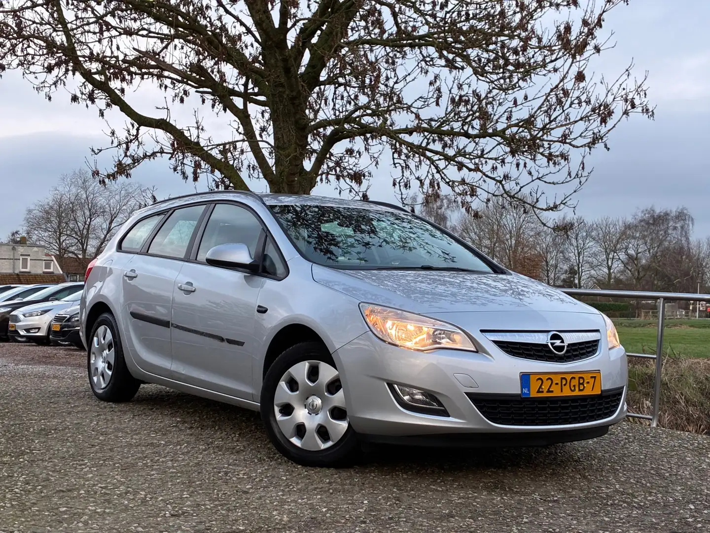 Opel Astra Sports Tourer 1.4 Selection | Cruise Nu € 1.975,-! Grau - 1