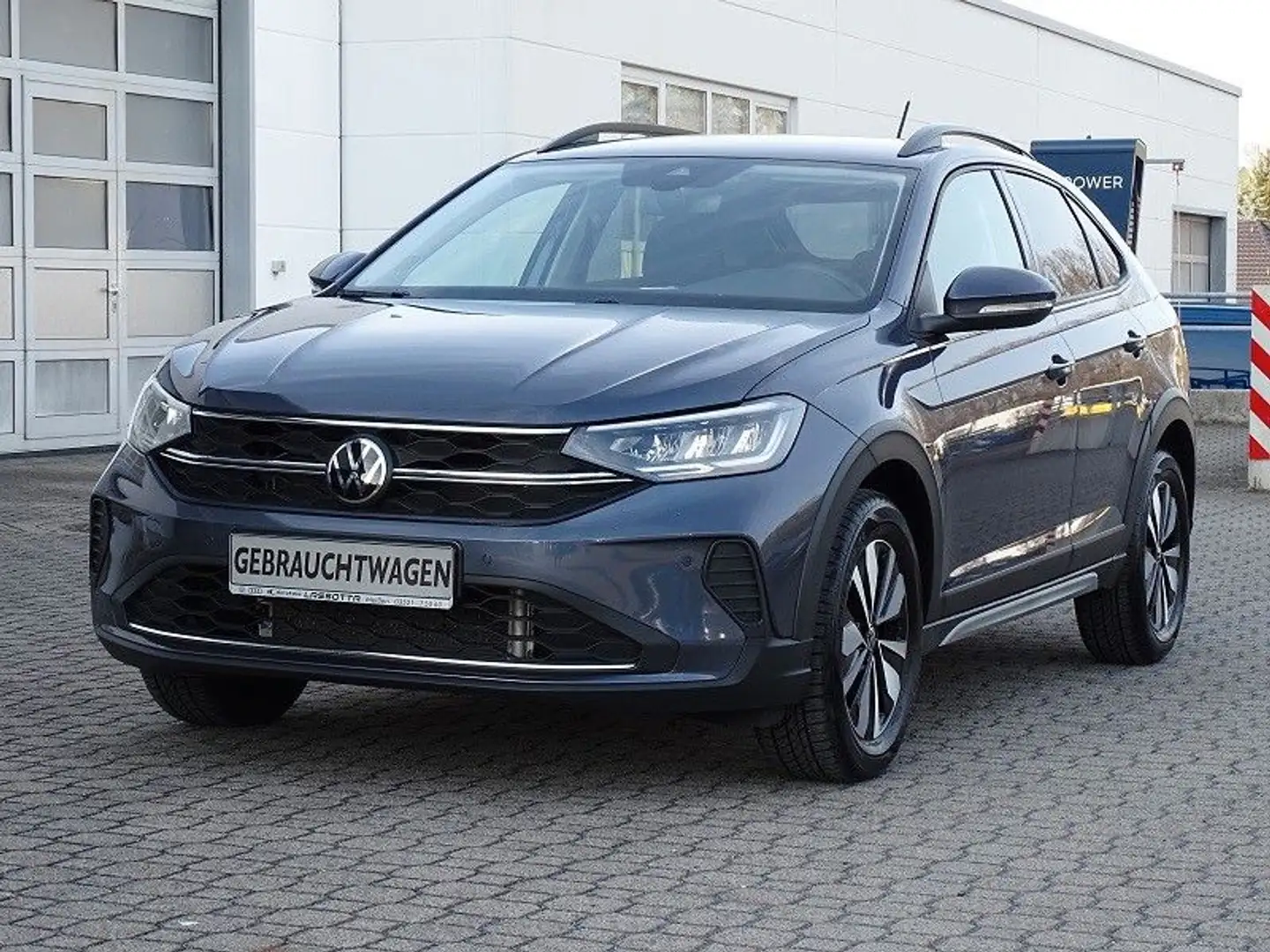 Volkswagen Taigo 1.0 TSI Move - LED / Navi / AHZV Grau - 1