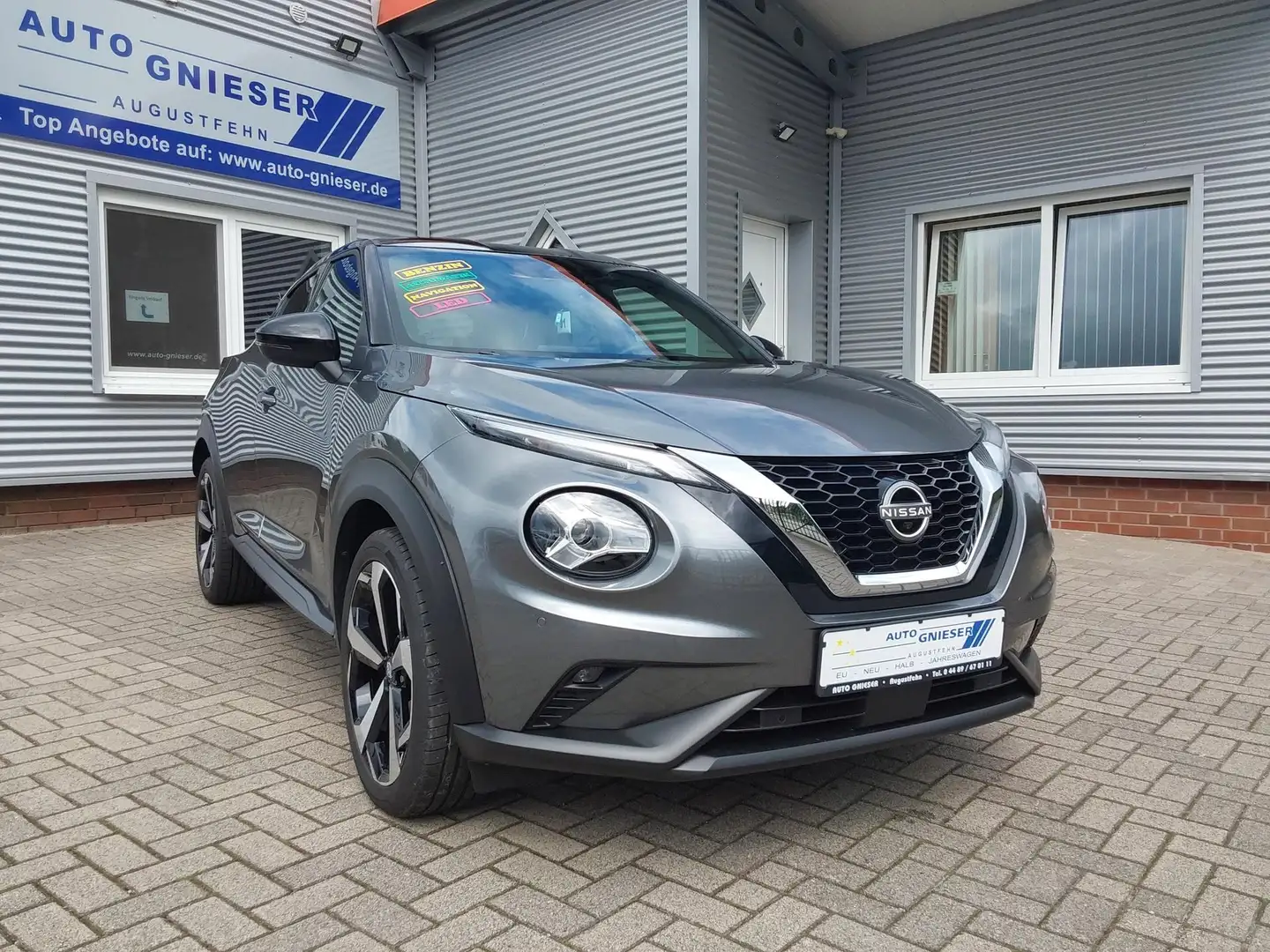 Nissan Juke 1.0 DIG-T Tekna ACC/APP/LED/SHZ/NAV/KAM/BOSE 84... Grau - 1