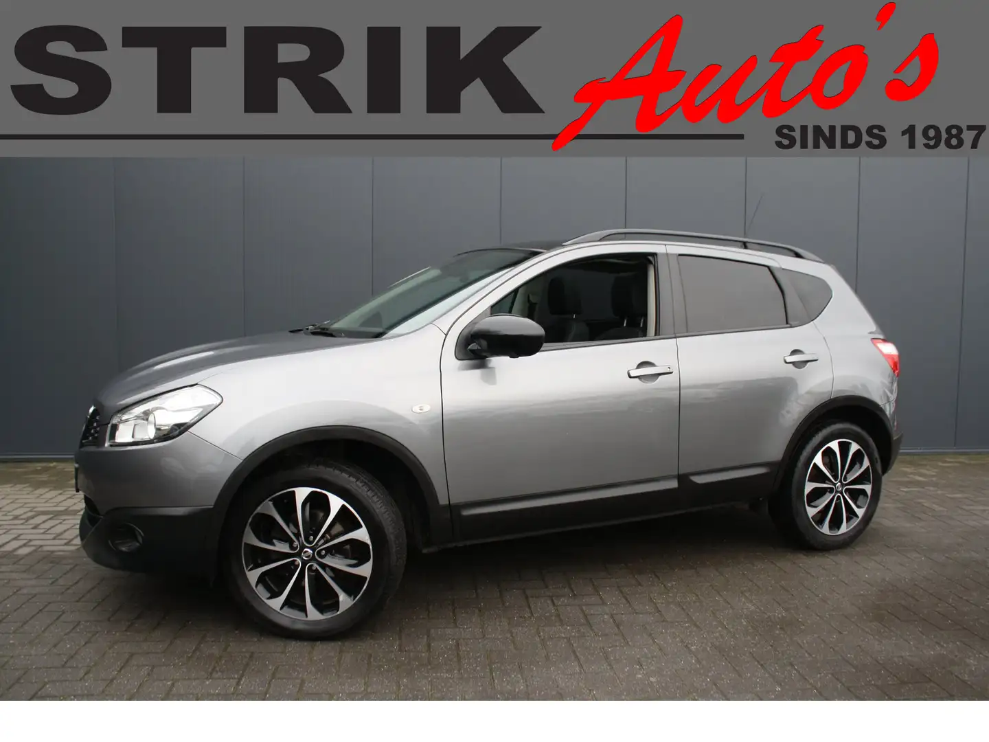 Nissan Qashqai 1.6 360 - NAVIGATIE - CAMERA - PANORAMADAK - TREKH Grau - 1