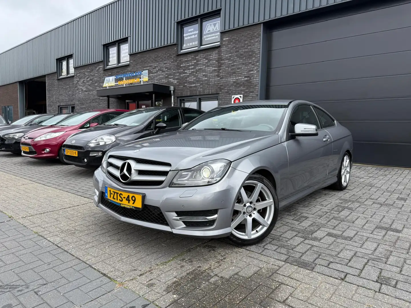Mercedes-Benz C 250 Coupé Sport Prestige | 12MND GARANTIE | XENON | ST Gris - 1