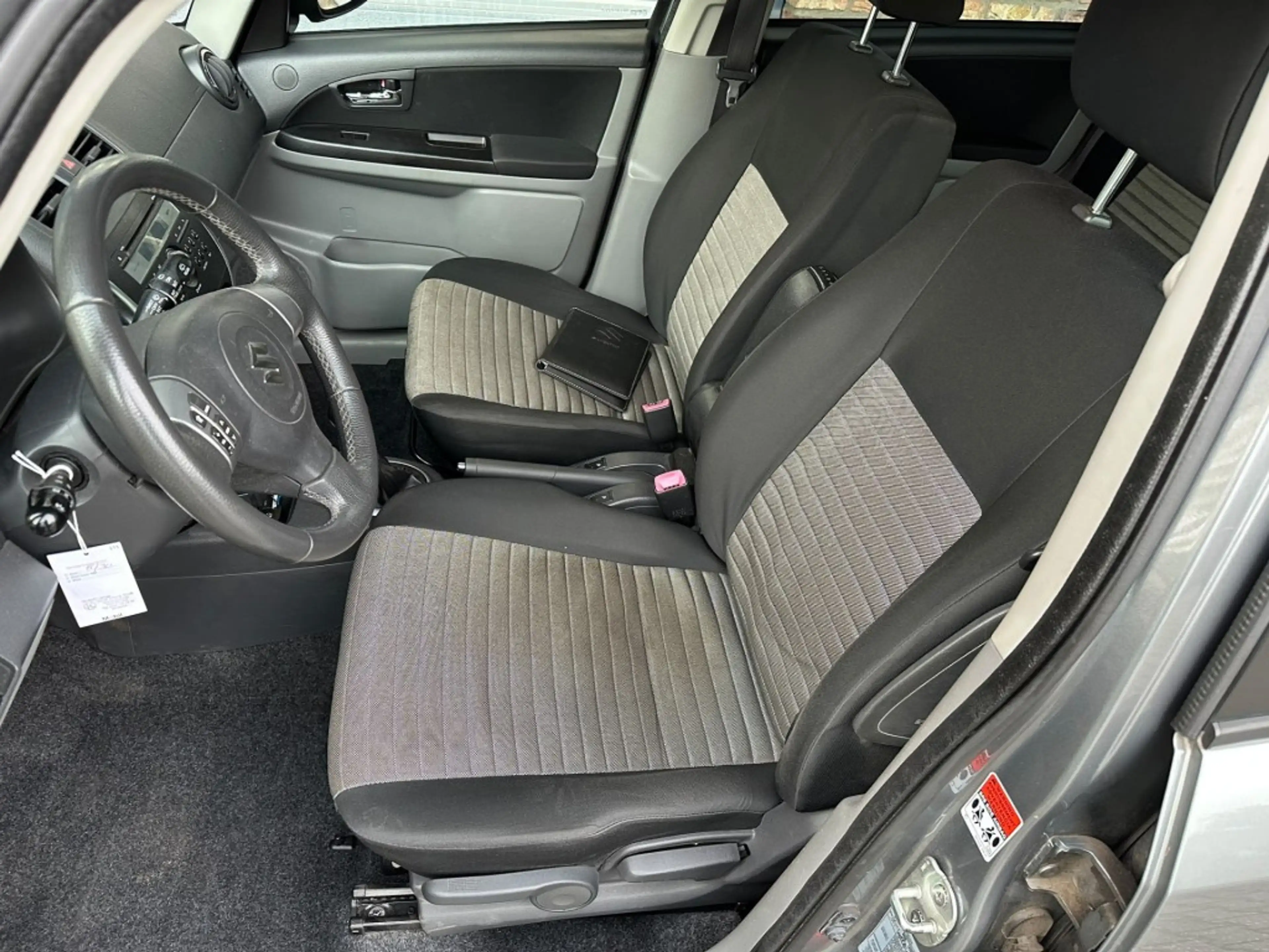 Suzuki SX4 1.6 EXCLUSIVE, Trekhaak, Stoelverwarming, Keyless, — photo 11