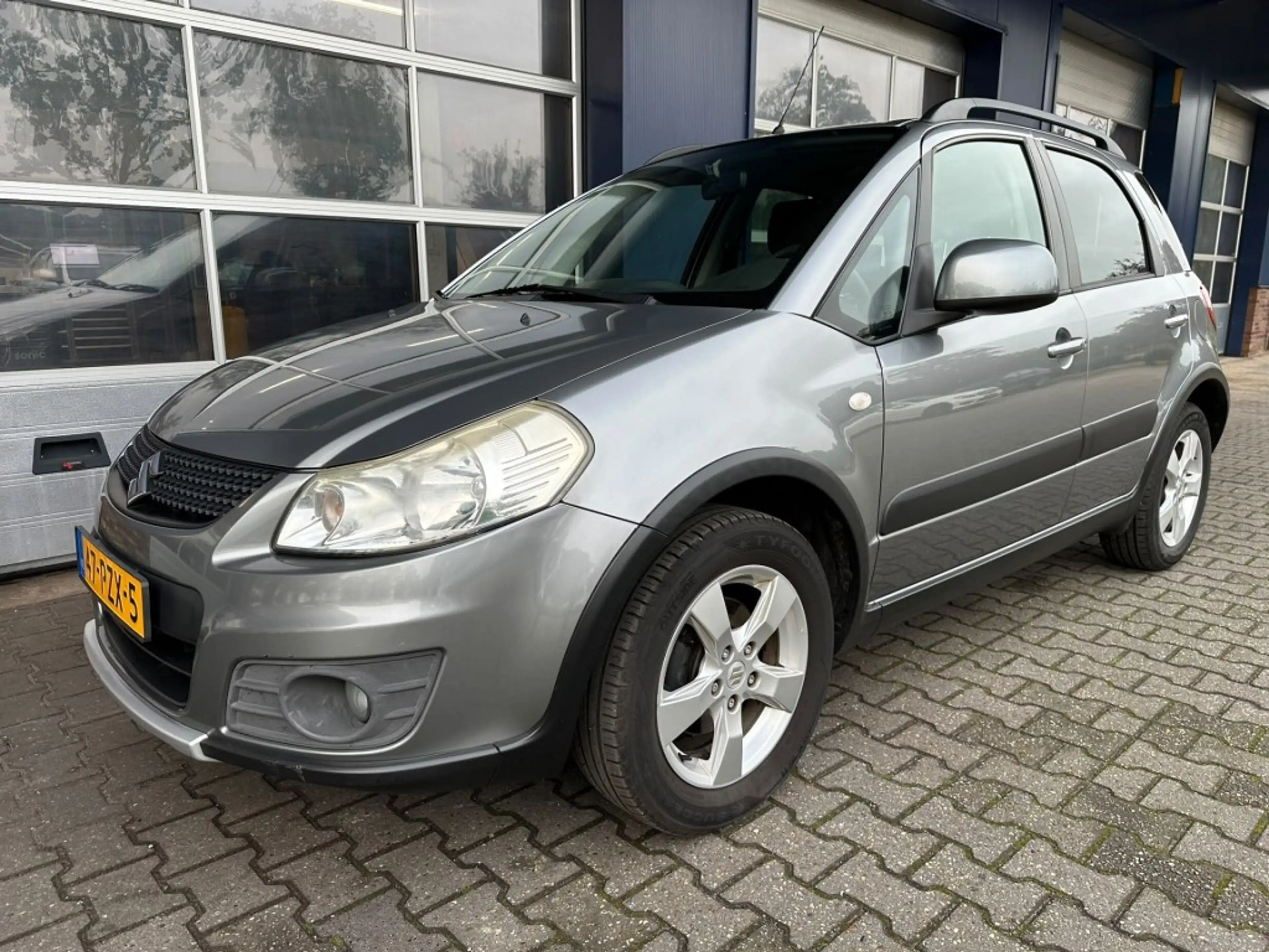 Suzuki SX4 1.6 EXCLUSIVE, Trekhaak, Stoelverwarming, Keyless,