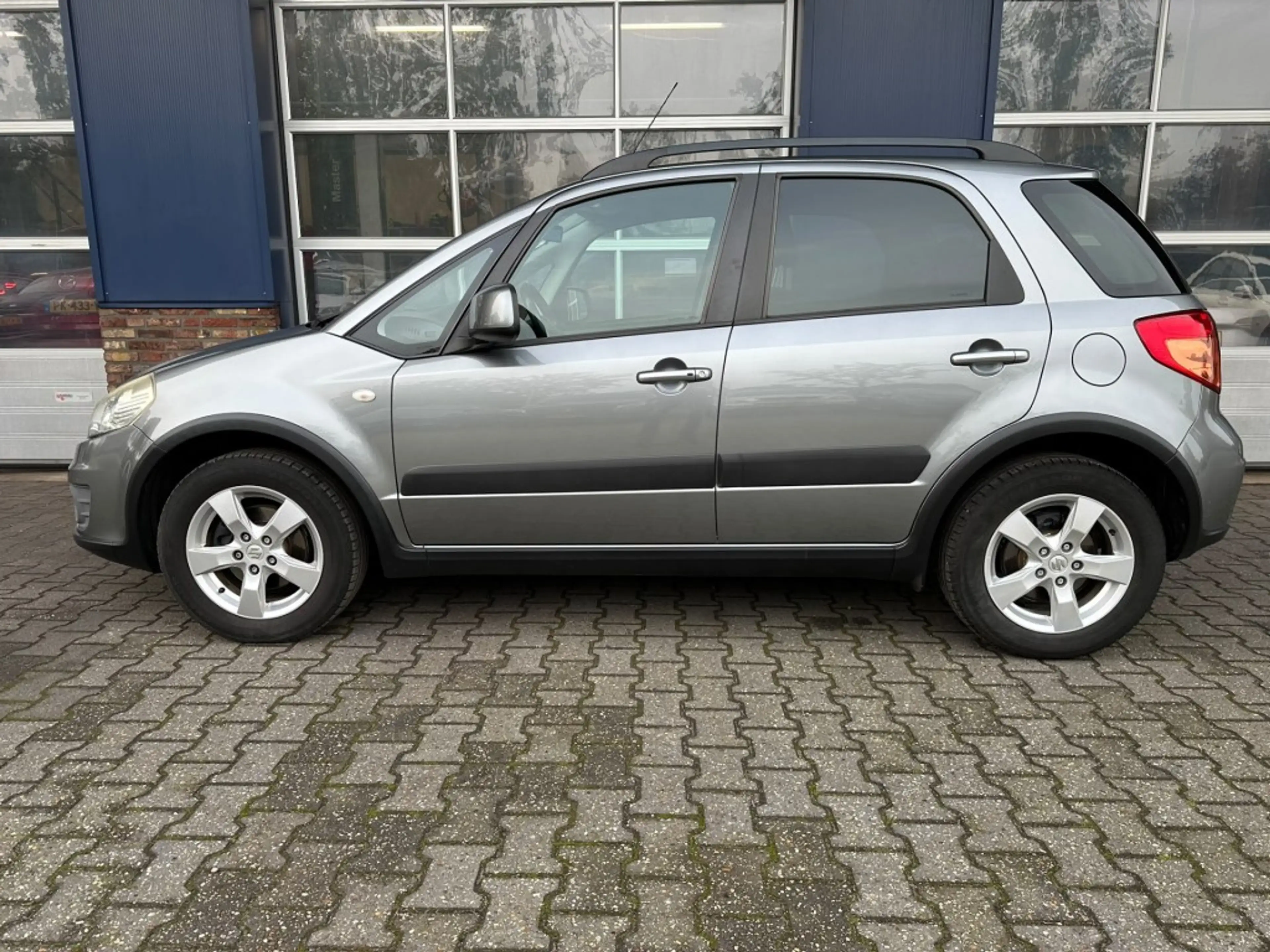 Suzuki SX4 1.6 EXCLUSIVE, Trekhaak, Stoelverwarming, Keyless, — photo 7