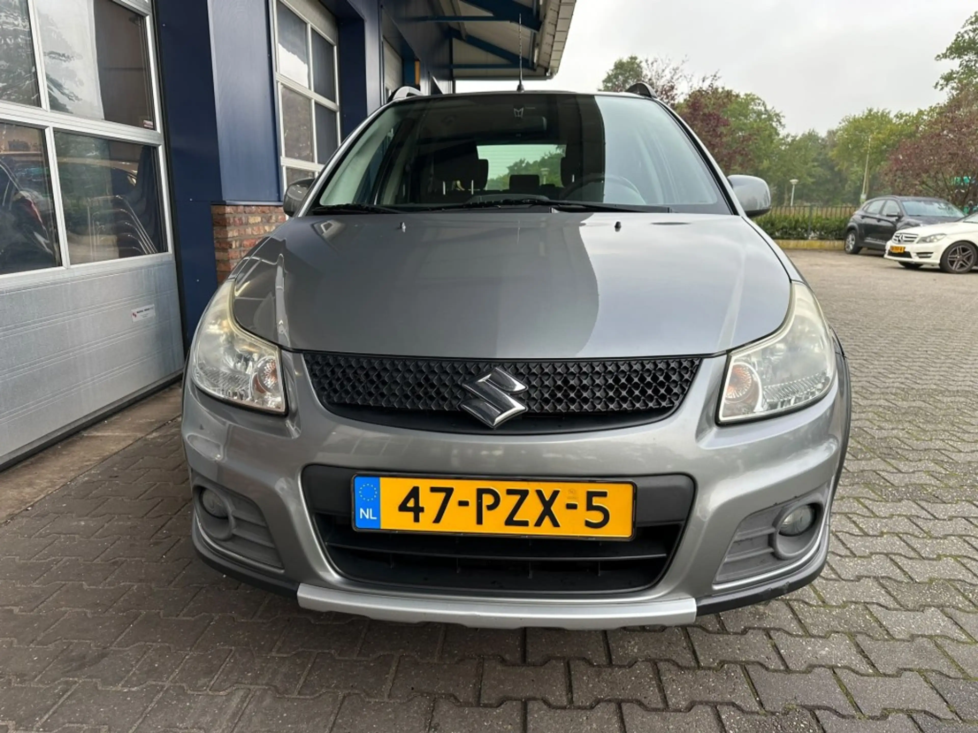 Suzuki SX4 1.6 EXCLUSIVE, Trekhaak, Stoelverwarming, Keyless, — photo 9