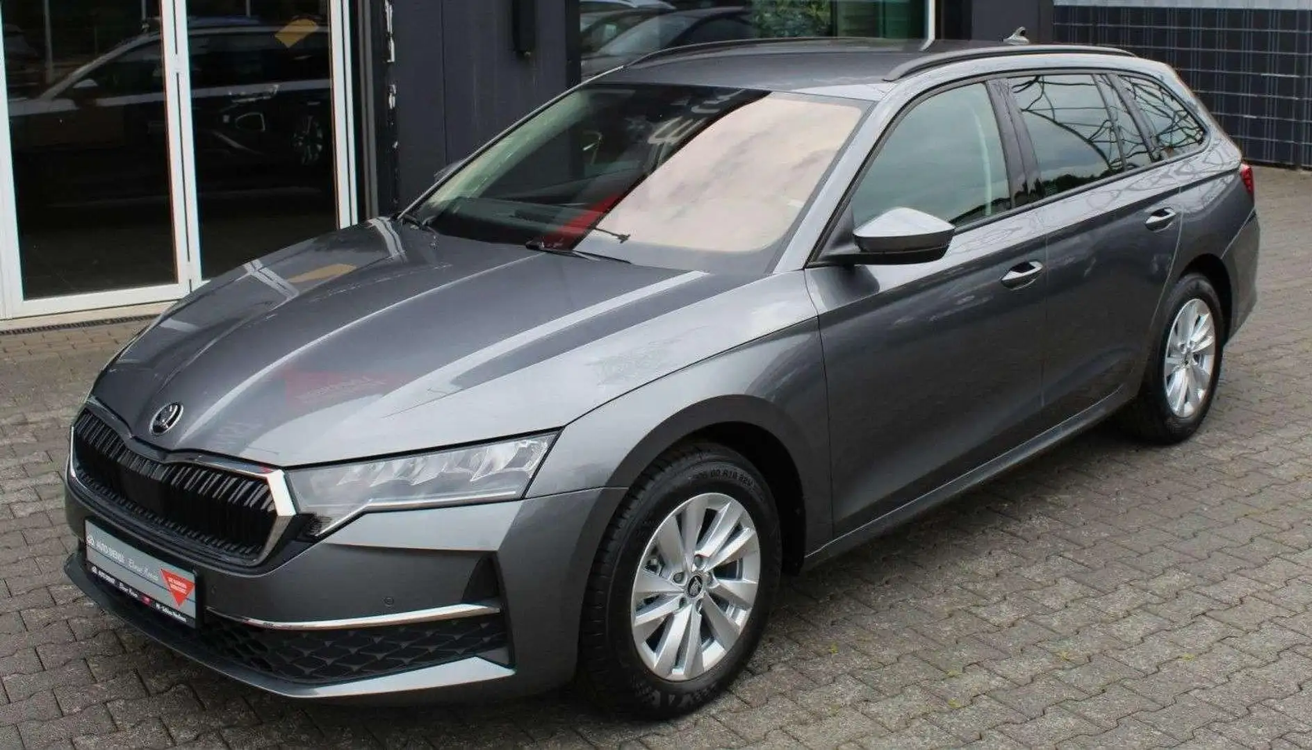Skoda Octavia Combi 1.5 TSI, 110 kW Selection, 130 Jah Grau - 1
