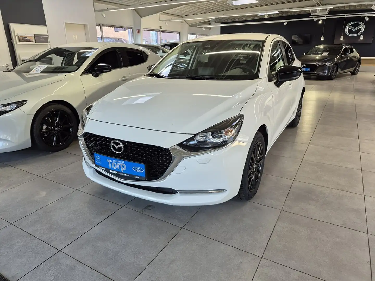 Mazda 2 Skyactiv G 90 PS M Hybrid  Homura Weiß - 1