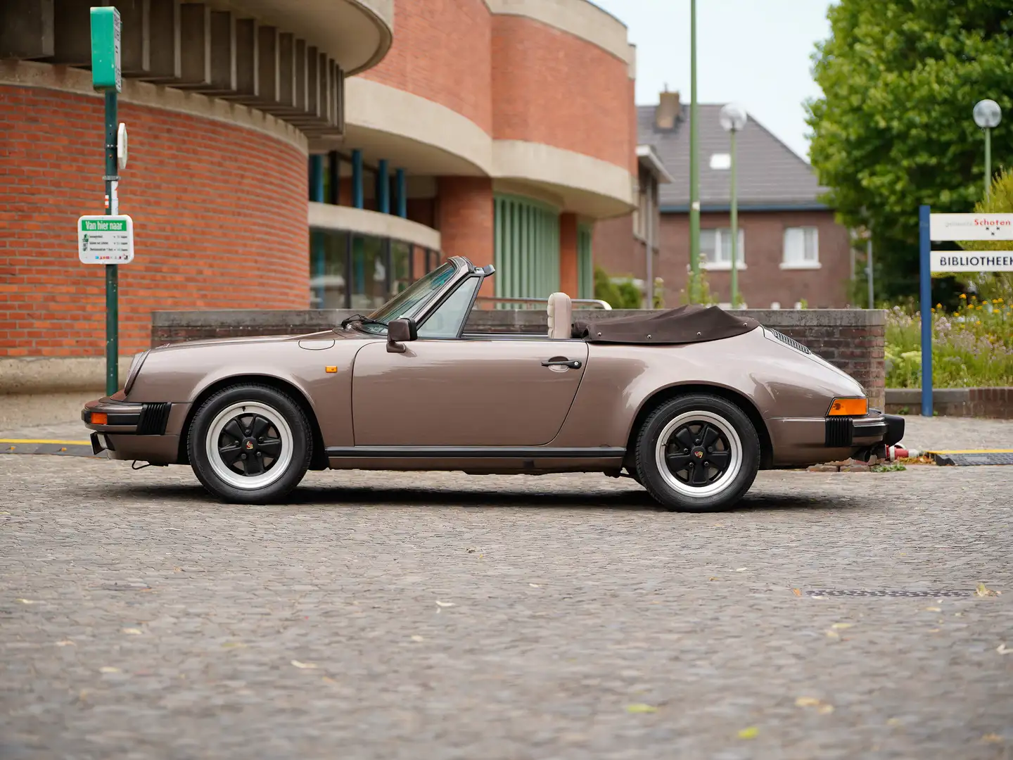 Porsche 911 3.2 Cabrio 231pk / 1 eigenaar / Prachtstaat Bronzo - 1