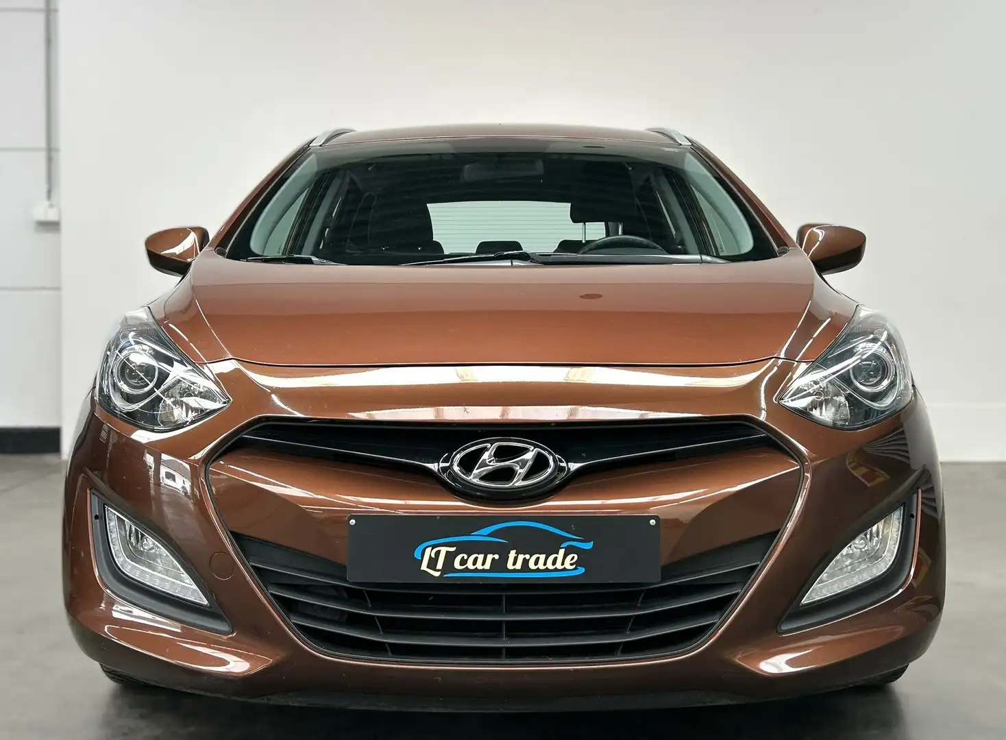 Hyundai i30 CW 1.4 Trend * Airco * Bluetooth * PDC * Garantie Bruin - 2