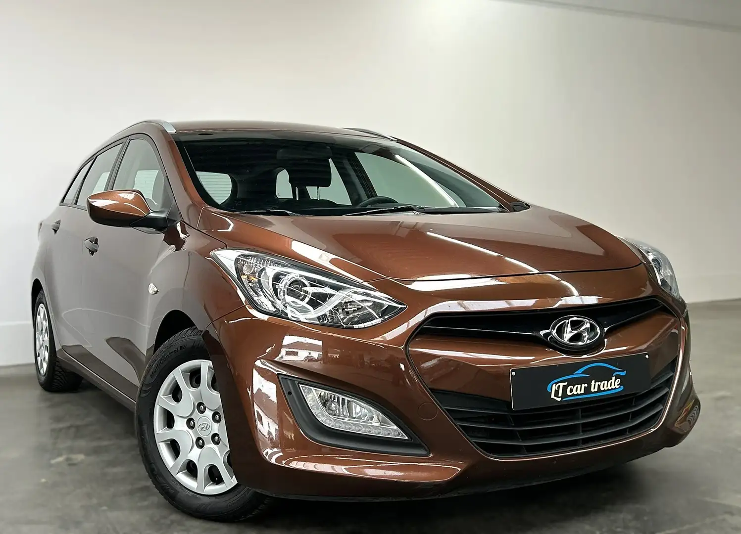 Hyundai i30 CW 1.4 Trend * Airco * Bluetooth * PDC * Garantie Bruin - 1