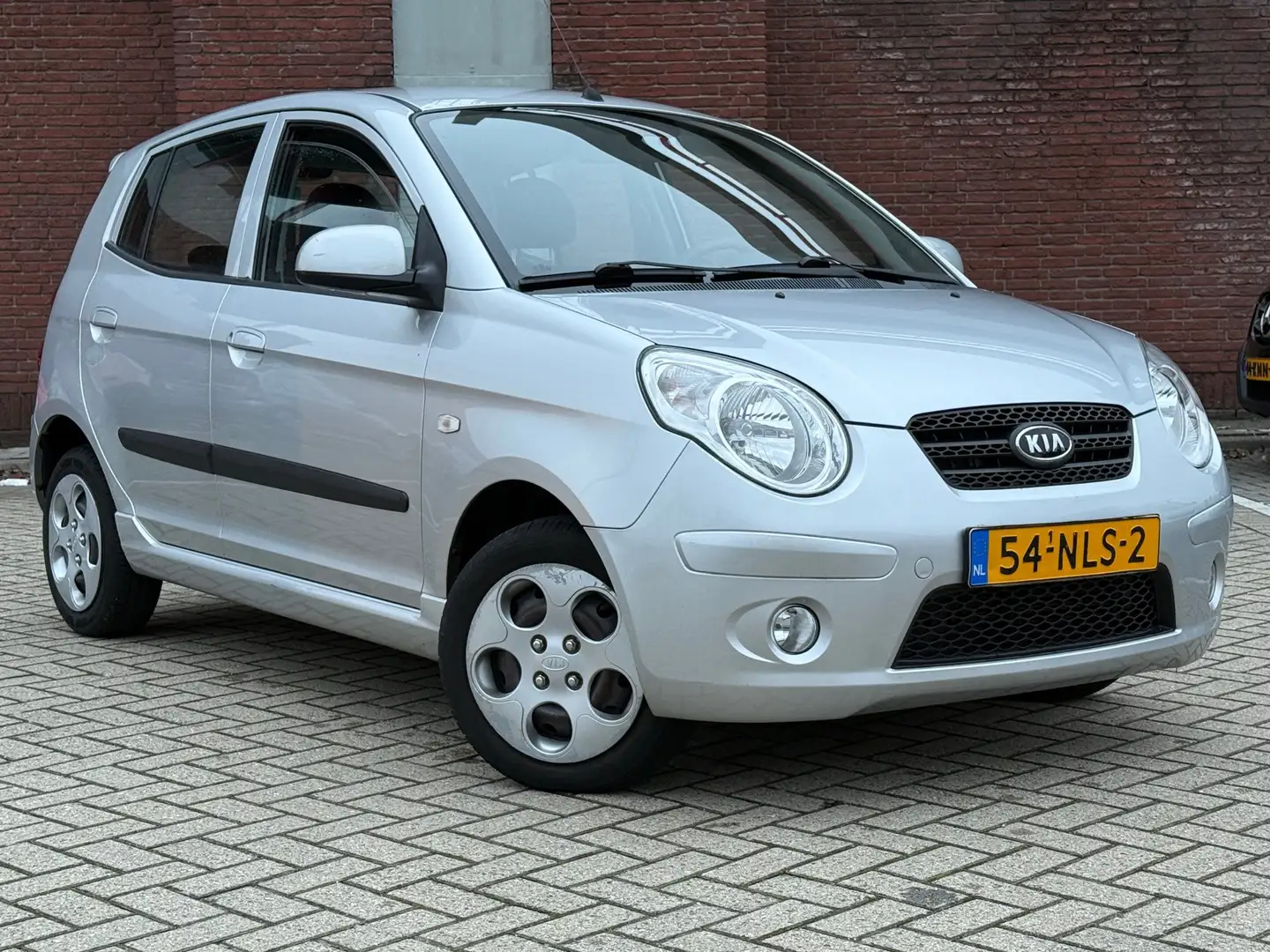 Kia Picanto 1.0 Seven|5DRS|AIRCO|1EIG|NAP|NIEUWSTAAT Grijs - 1