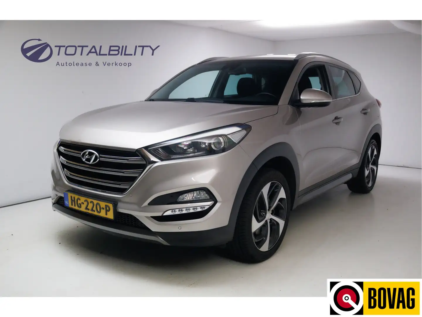 Hyundai TUCSON 1.6 GDi Comfort 132 PK | 19" | Camera | Stoel- & A Grijs - 1