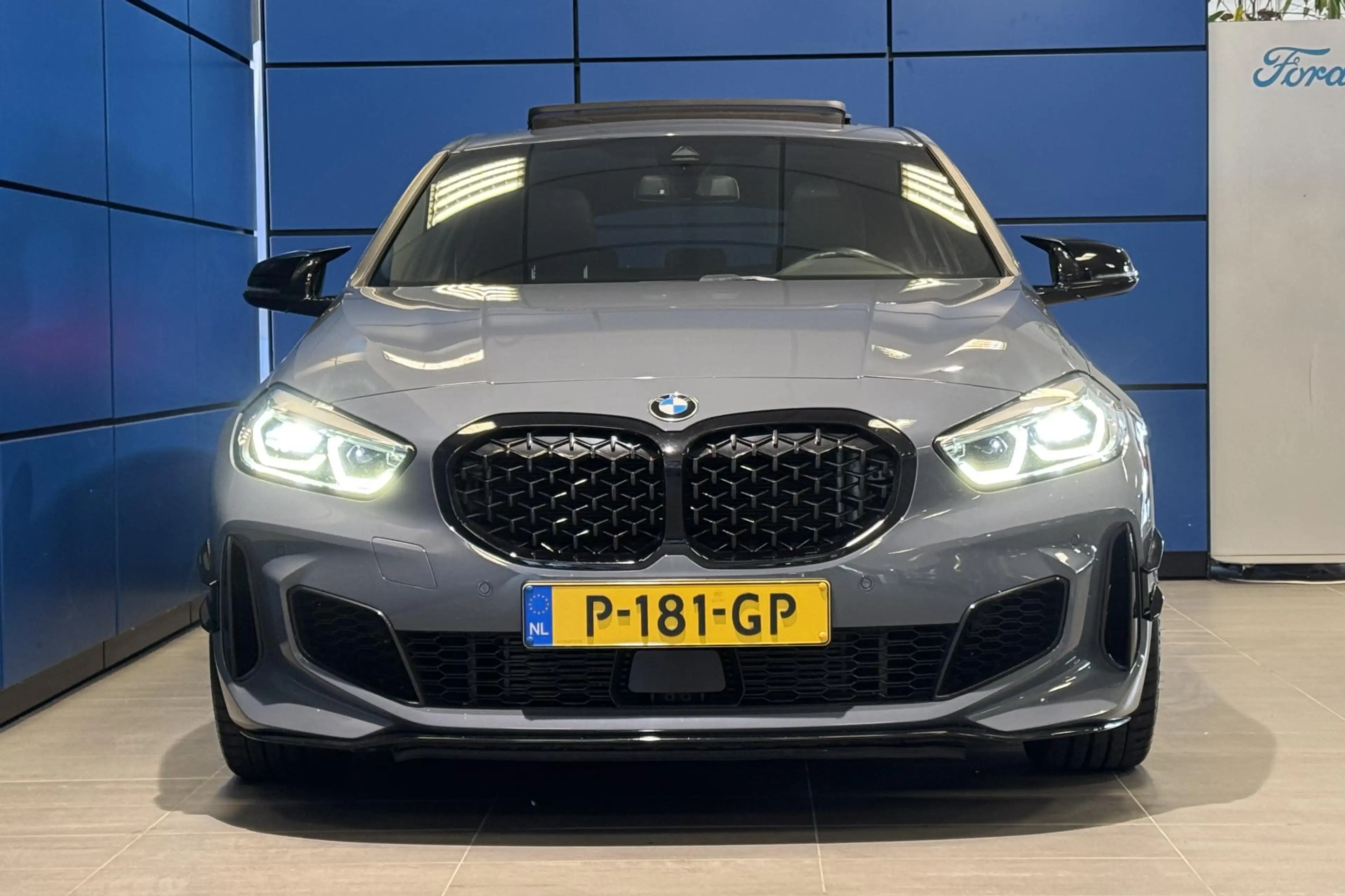 BMW 135 1-serie M135i xDrive High Executive Panoramadak|st — photo 2