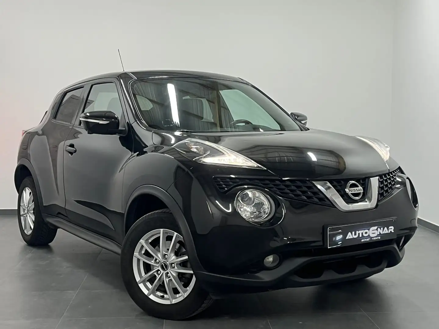 Nissan Juke 1.5 dCi 2WD - Airco - Navi - Camera - Carnet Zwart - 1