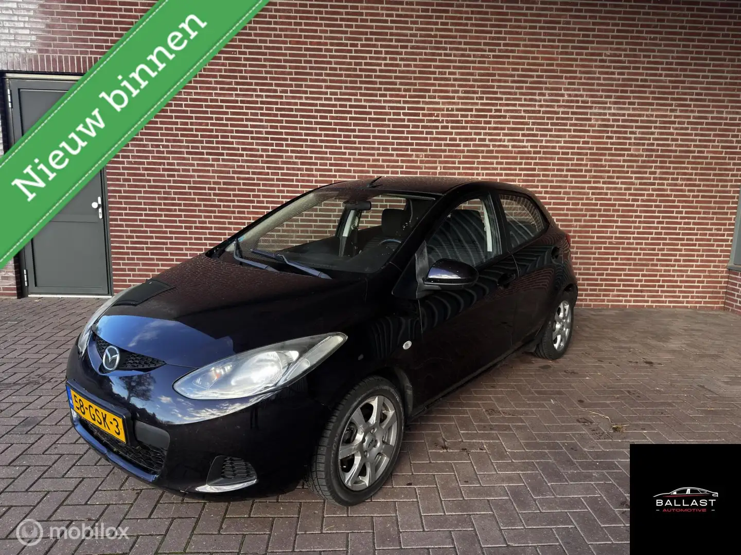 Mazda 2 1.3 S-VT Touring WATERSCHADE AUTO RIJDBAAR Rot - 1