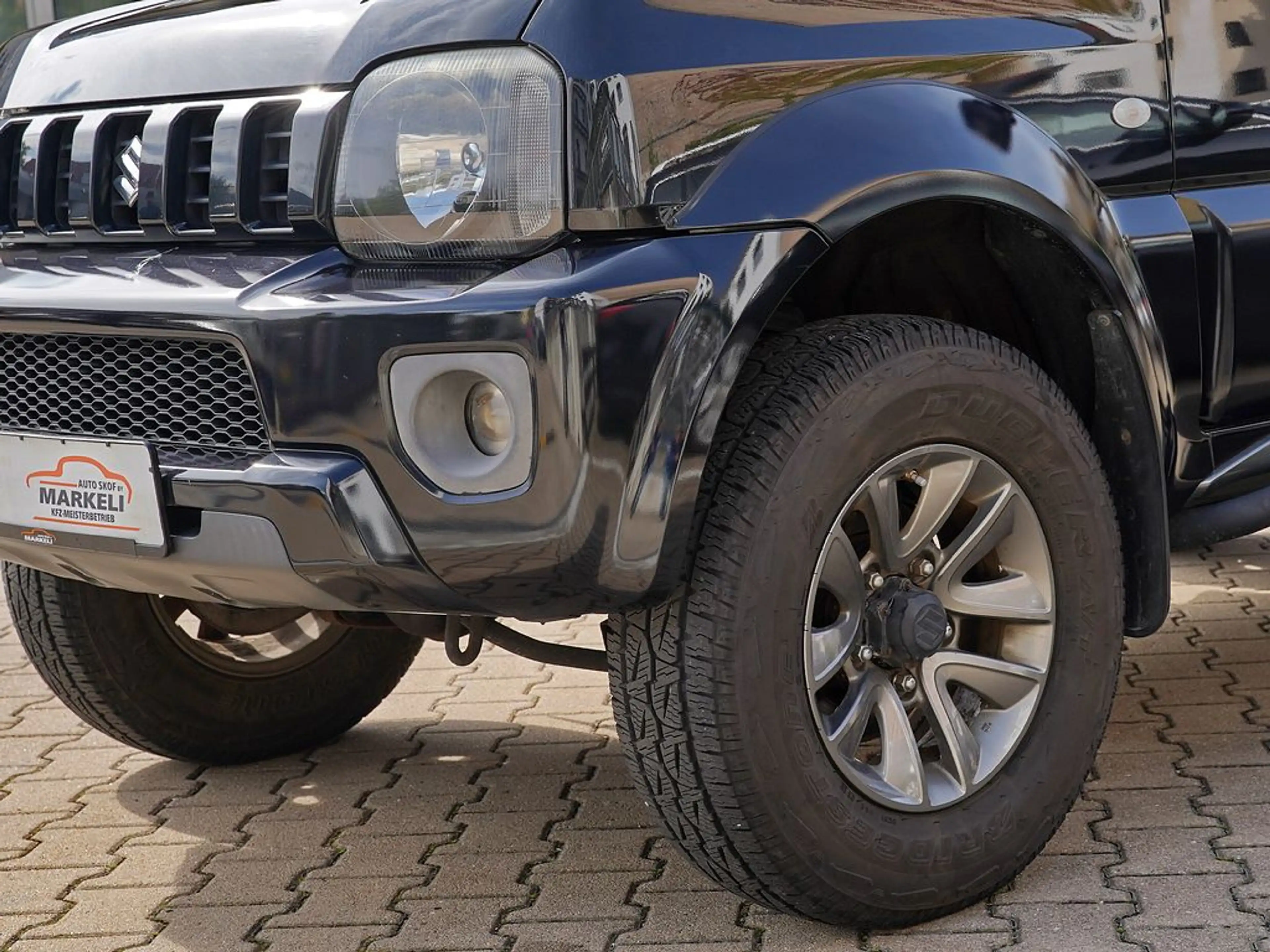 Suzuki Jimny 1.3 Ranger Style 4x4 | Höherlegung m. ABE | US Army Erstbesitz | AHK | Klima | Sitzhzg. — photo 13