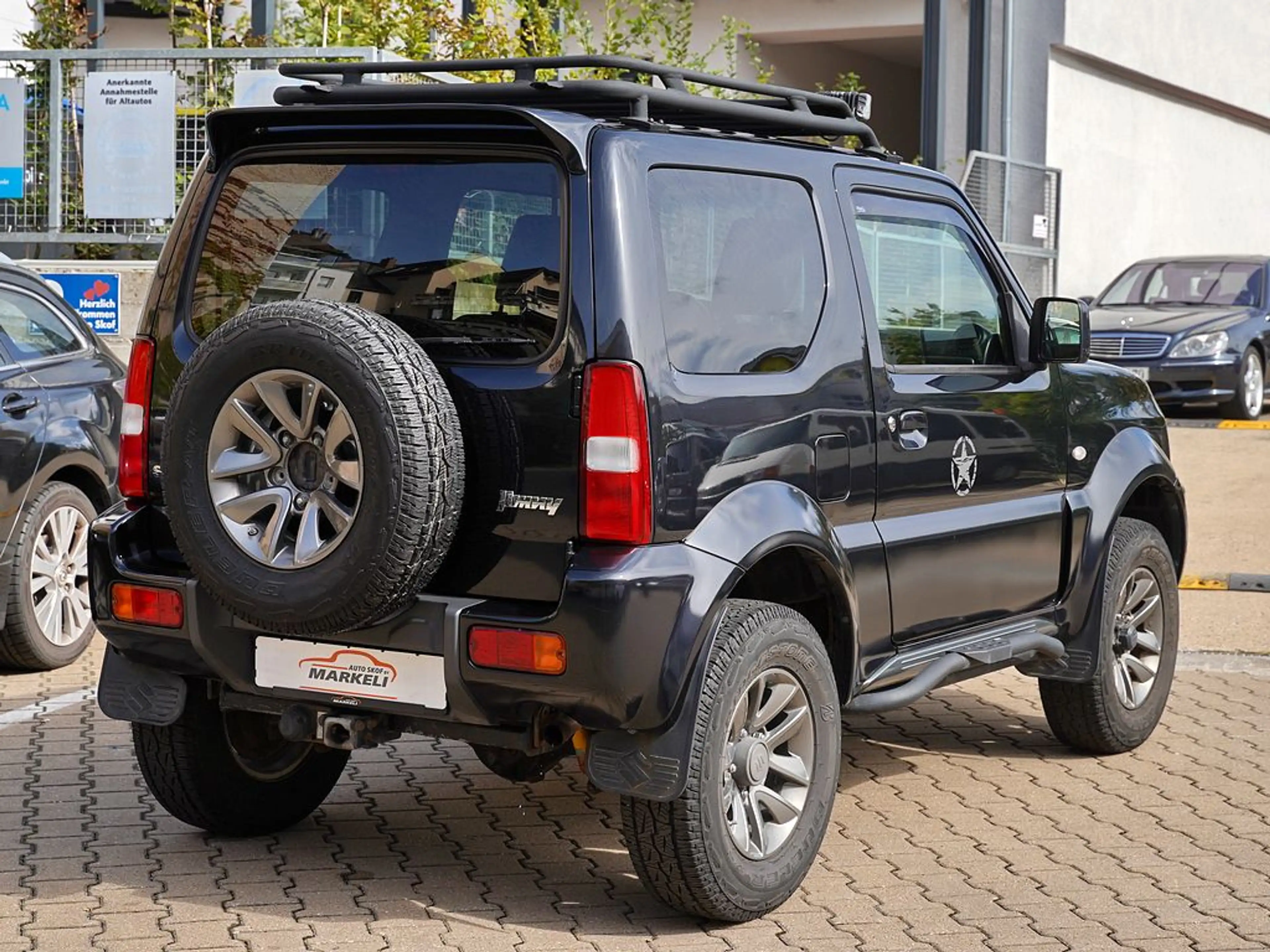 Suzuki Jimny 1.3 Ranger Style 4x4 | Höherlegung m. ABE | US Army Erstbesitz | AHK | Klima | Sitzhzg. — photo 3