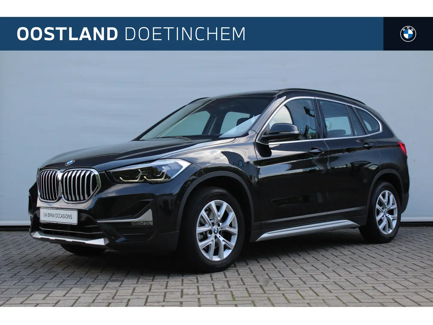 BMW X1 sDrive18i High Executive xLine Automaat / Panorama Zwart - 1
