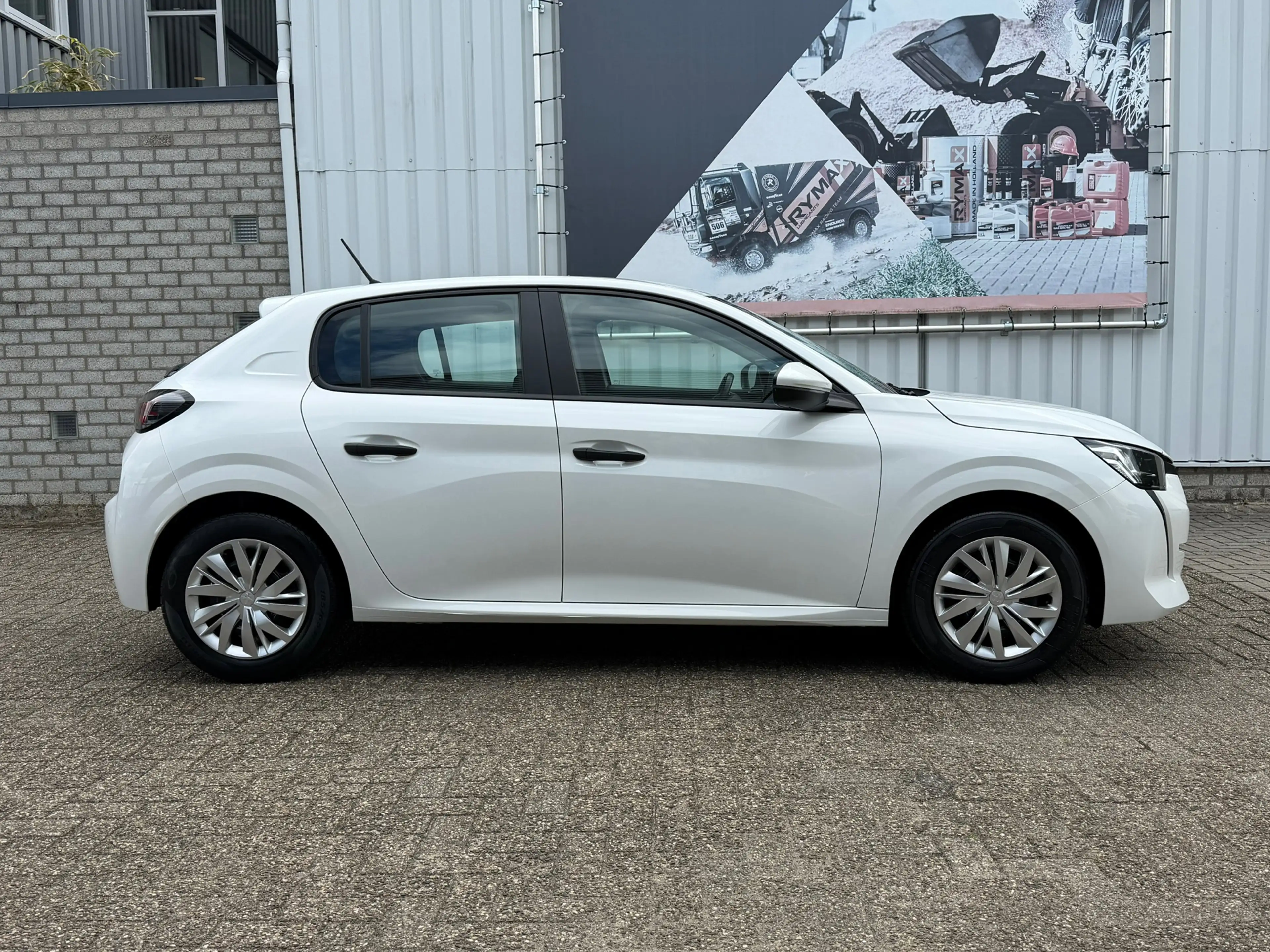 Peugeot 208 1.2 PureTech Allure Pack | Navigatie | Airco | Cru — photo 9