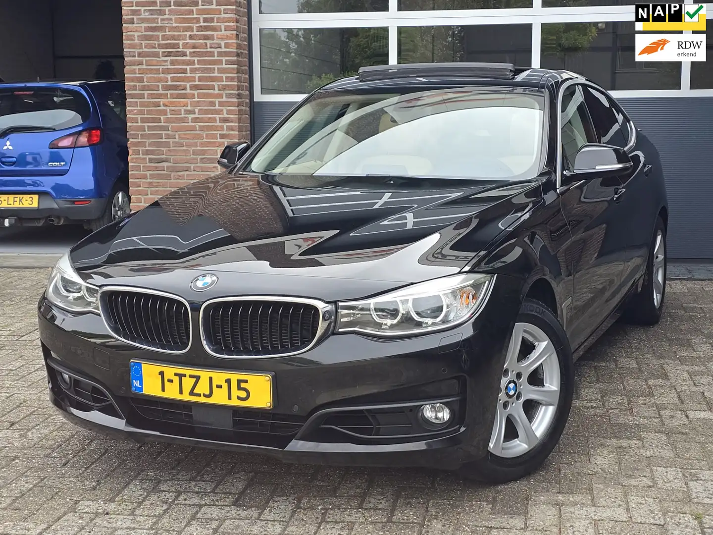 BMW 320 3-serie Gran Turismo 320i Executive GT| Pano|Navi Zwart - 1