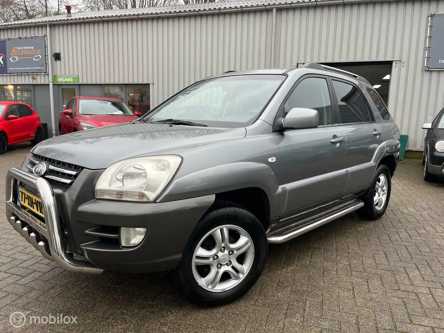 Kia Sportage 2.0 CVVT X-ecutive LPG/G3 Gris - 1