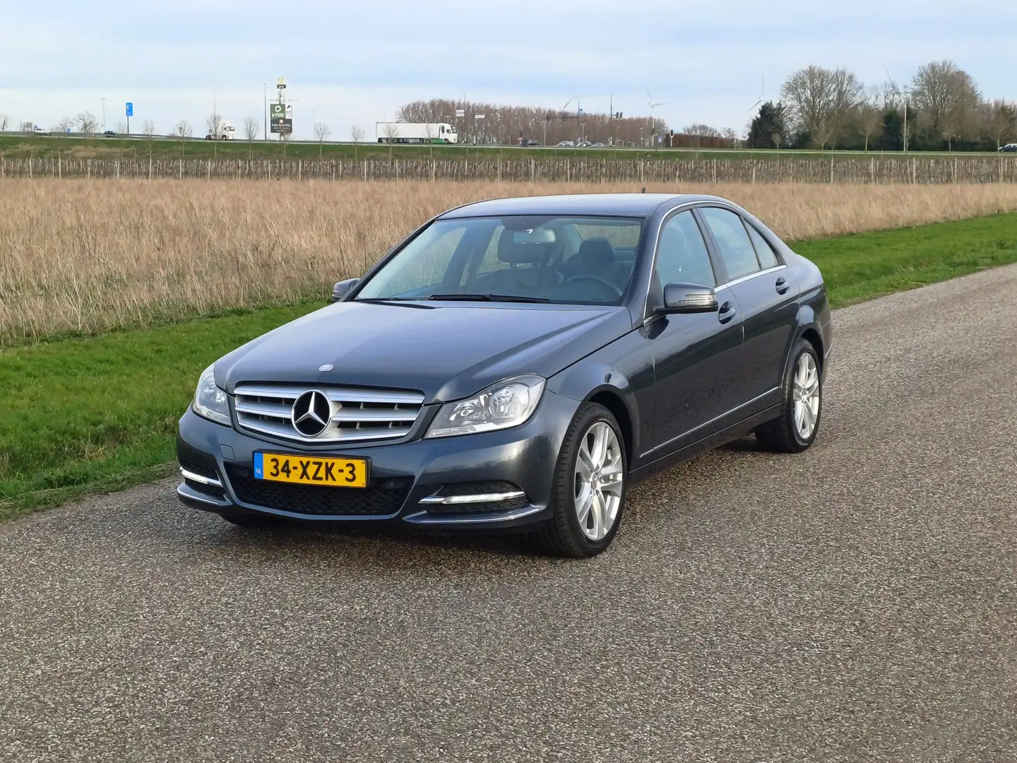 Mercedes-Benz C 180 Business Class Avantgarde Nieuwstaat! | Lage KM st Grijs - 2