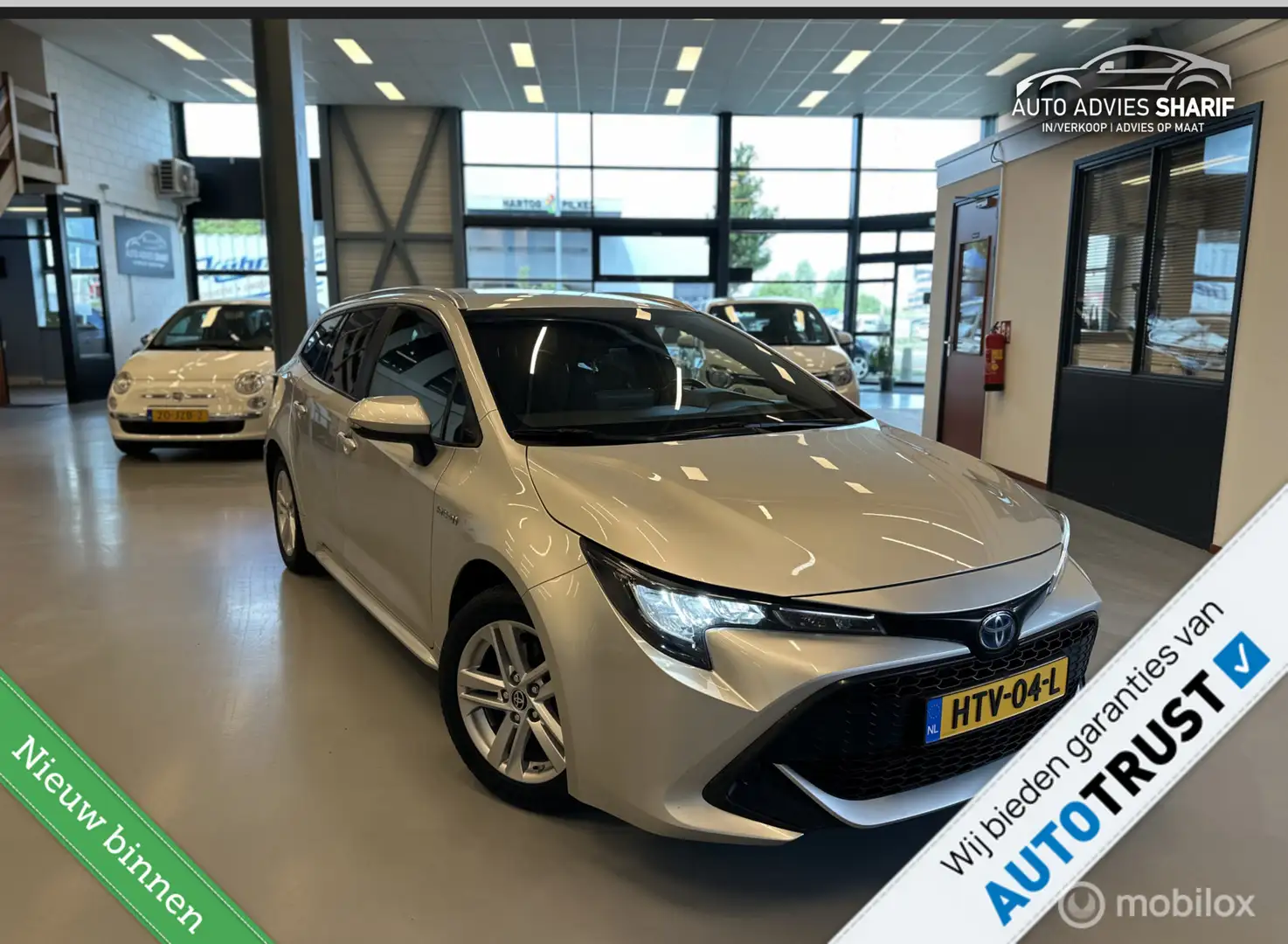 Toyota Corolla Touring Sports 1.8 Hybrid Dynamic Full optie Grijs - 1