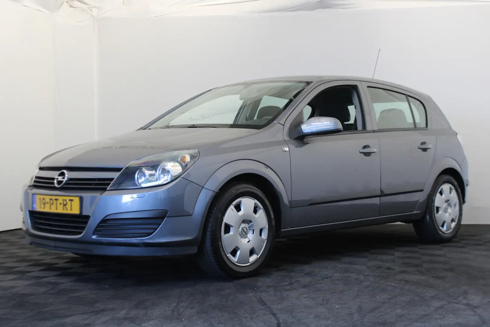 Opel Astra 1.6 Enjoy Grijs - 1