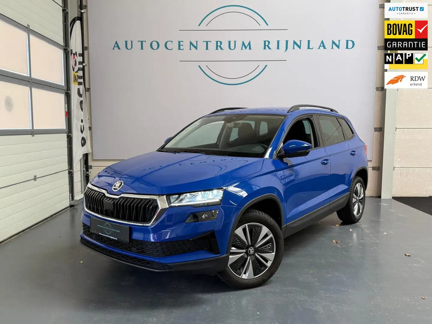 Skoda Karoq 1.5 TSI ACT Business Edition Plus 1 JAAR BOVAG GAR Blauw - 1