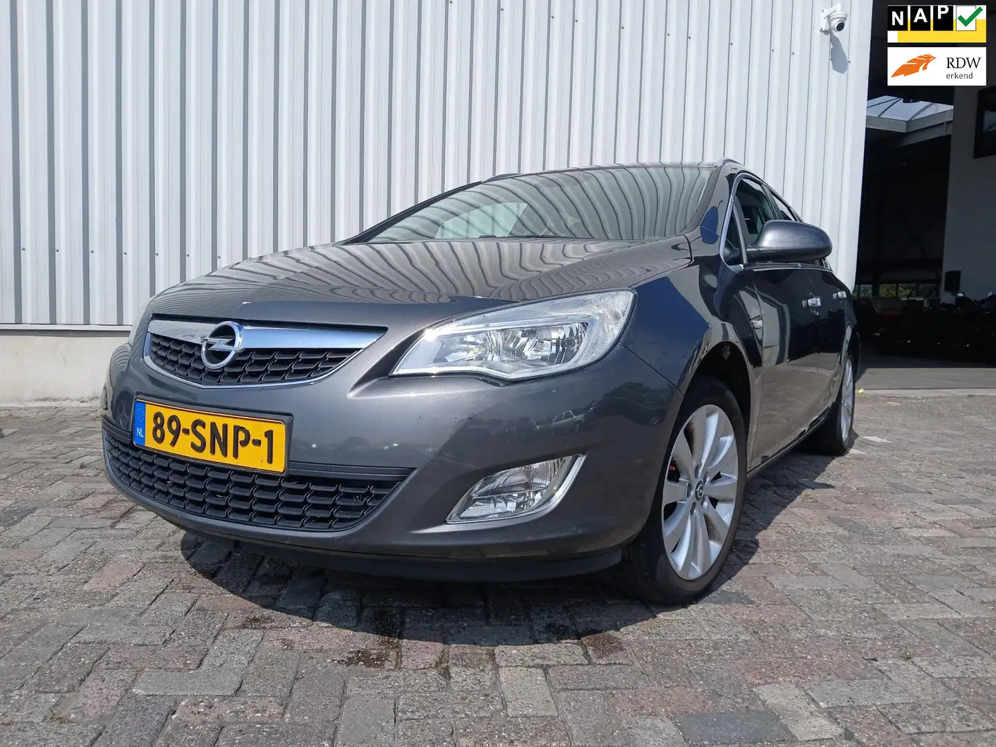 Opel Astra Sports Tourer 1.4 Cosmo - Airco - Leer - Motor Def Grijs - 1