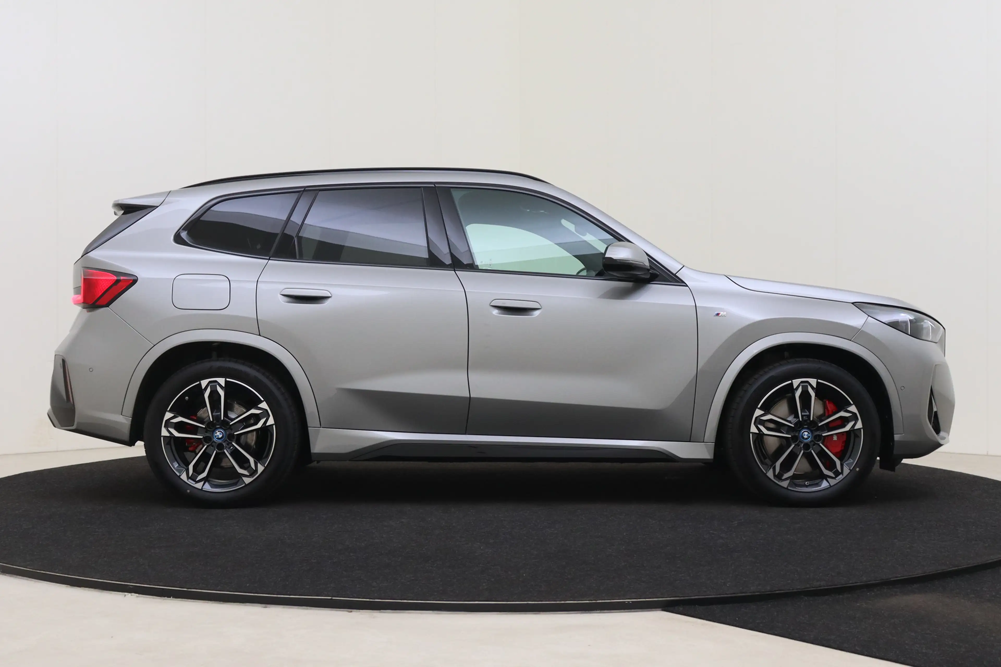 BMW X1 xDrive25e M Sport Automaat / Sportstoelen / Achter — photo 7