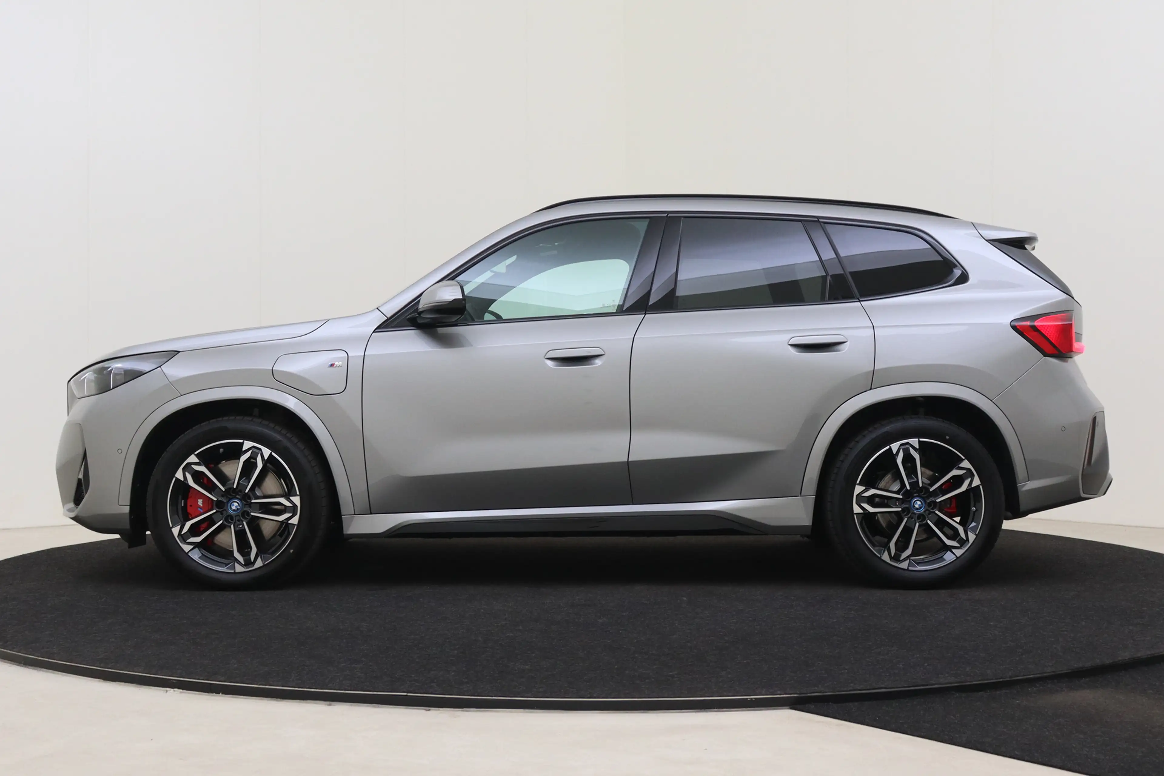 BMW X1 xDrive25e M Sport Automaat / Sportstoelen / Achter — photo 14