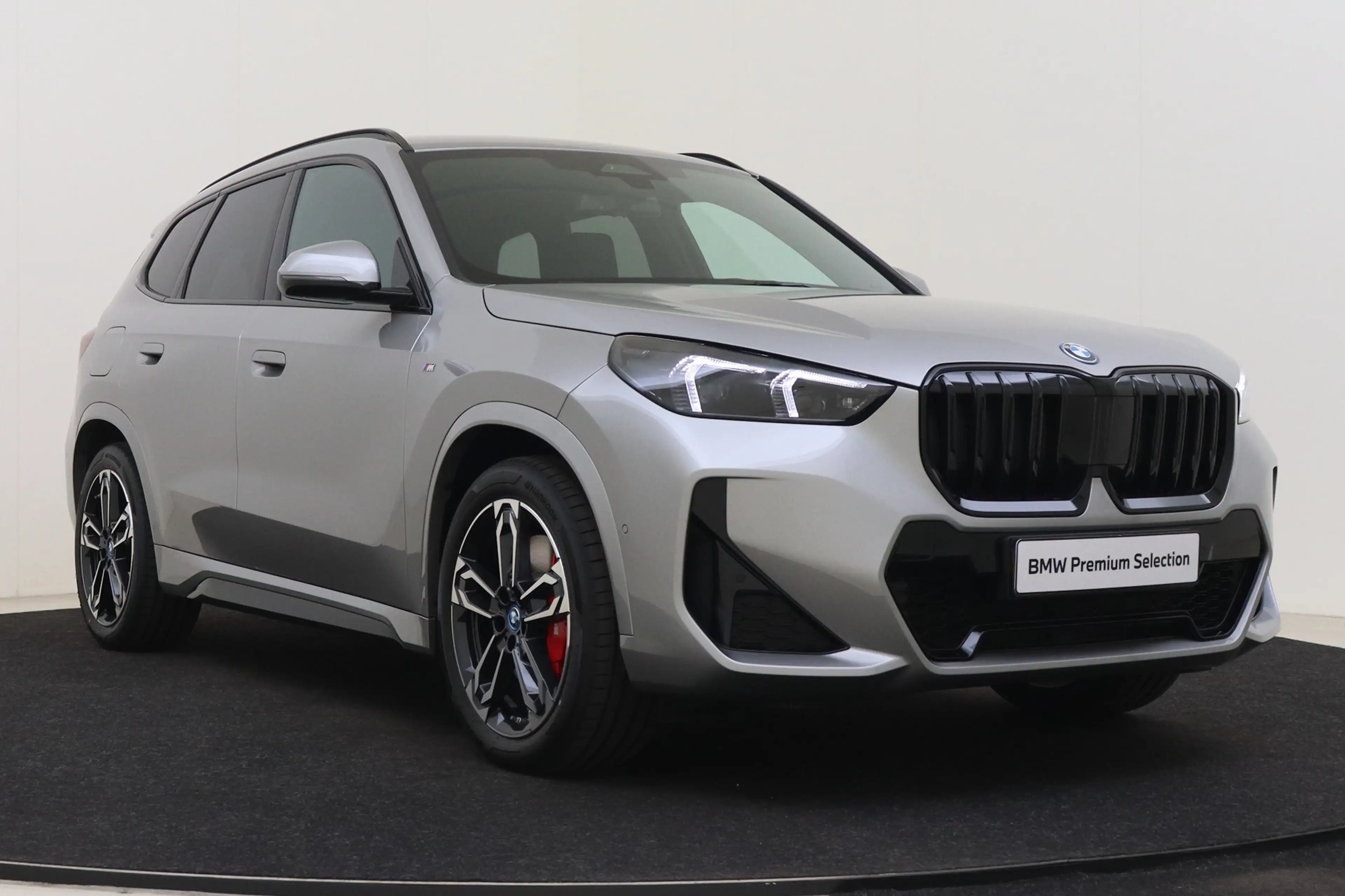 BMW X1 xDrive25e M Sport Automaat / Sportstoelen / Achter — photo 13