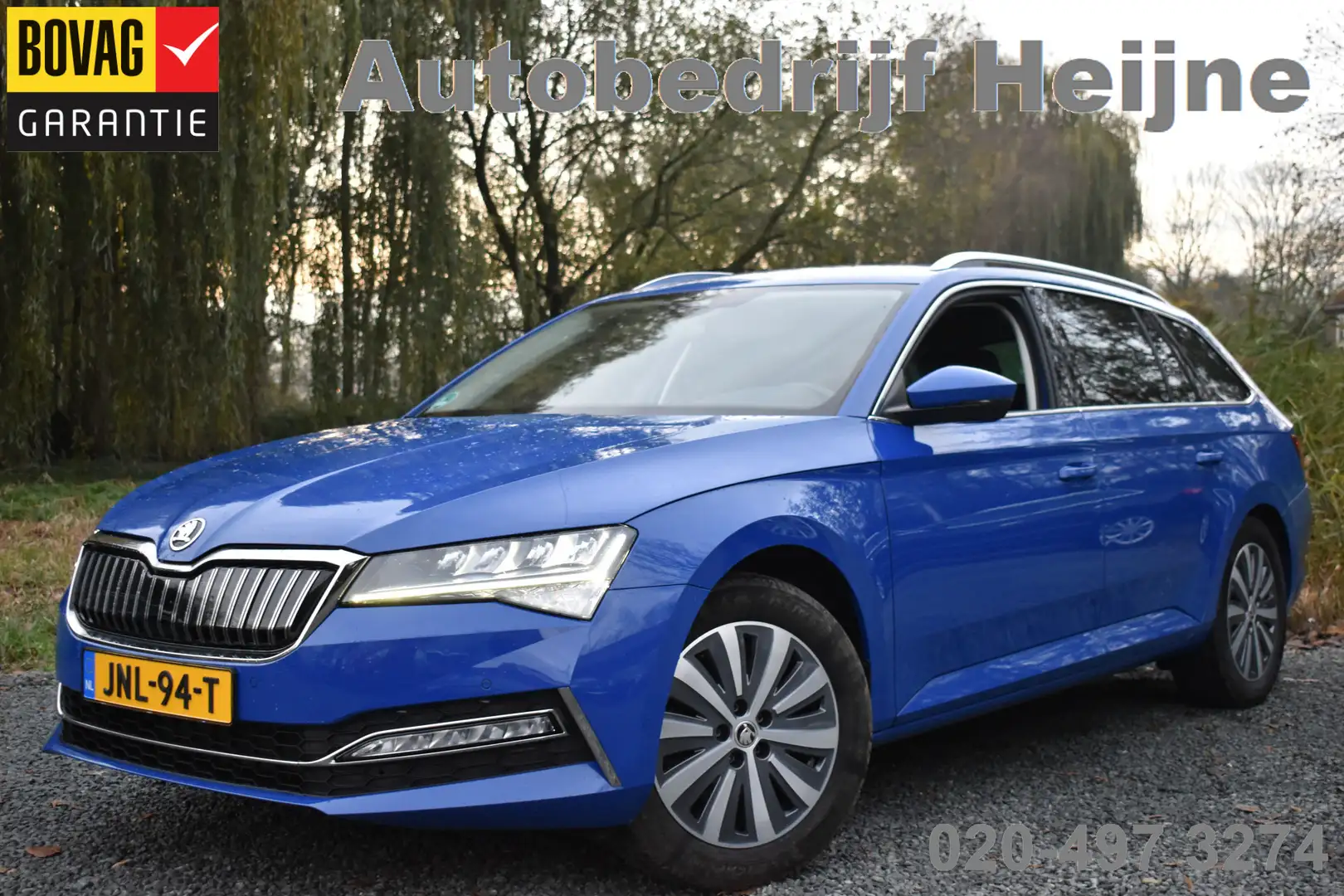 Skoda Superb Combi iV 218PK DSG HYBRID BUSINESS VIRTUAL/NAVI/TR Blauw - 1