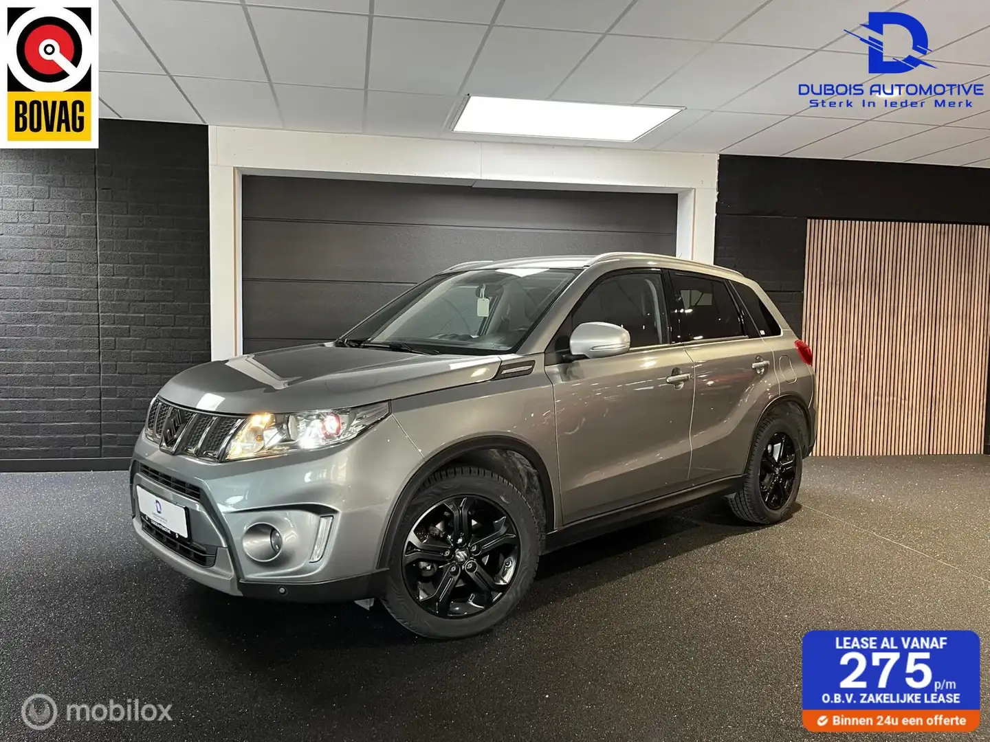 Suzuki Vitara 1.4 S Allgrip|TREKHAAK|NAVI|CAMERA|LEDER|STLVW Grijs - 1
