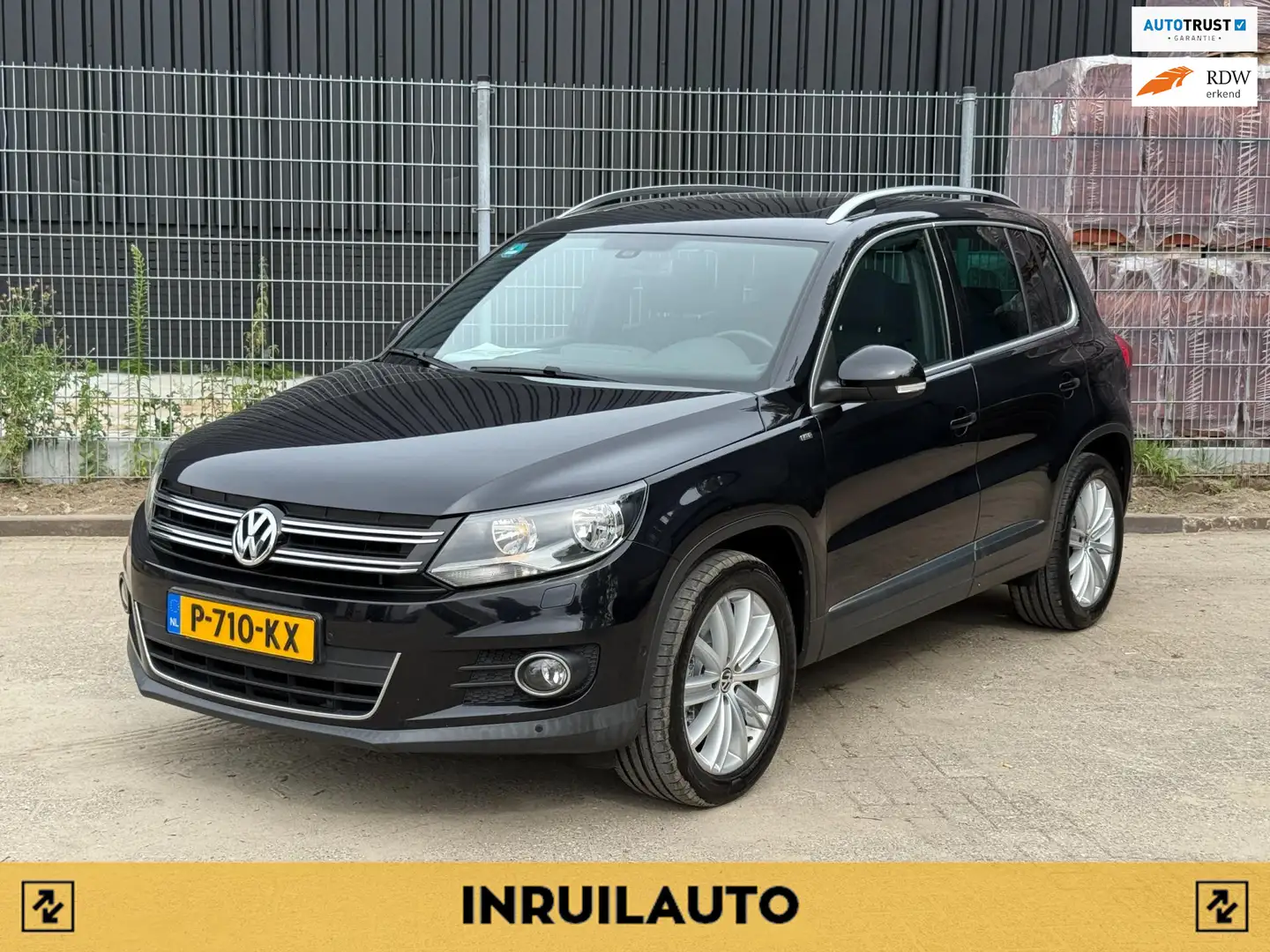 Volkswagen Tiguan 1.4 TSI R-Line Edition|Pano|Trekhaak|Dynaudio Zwart - 1