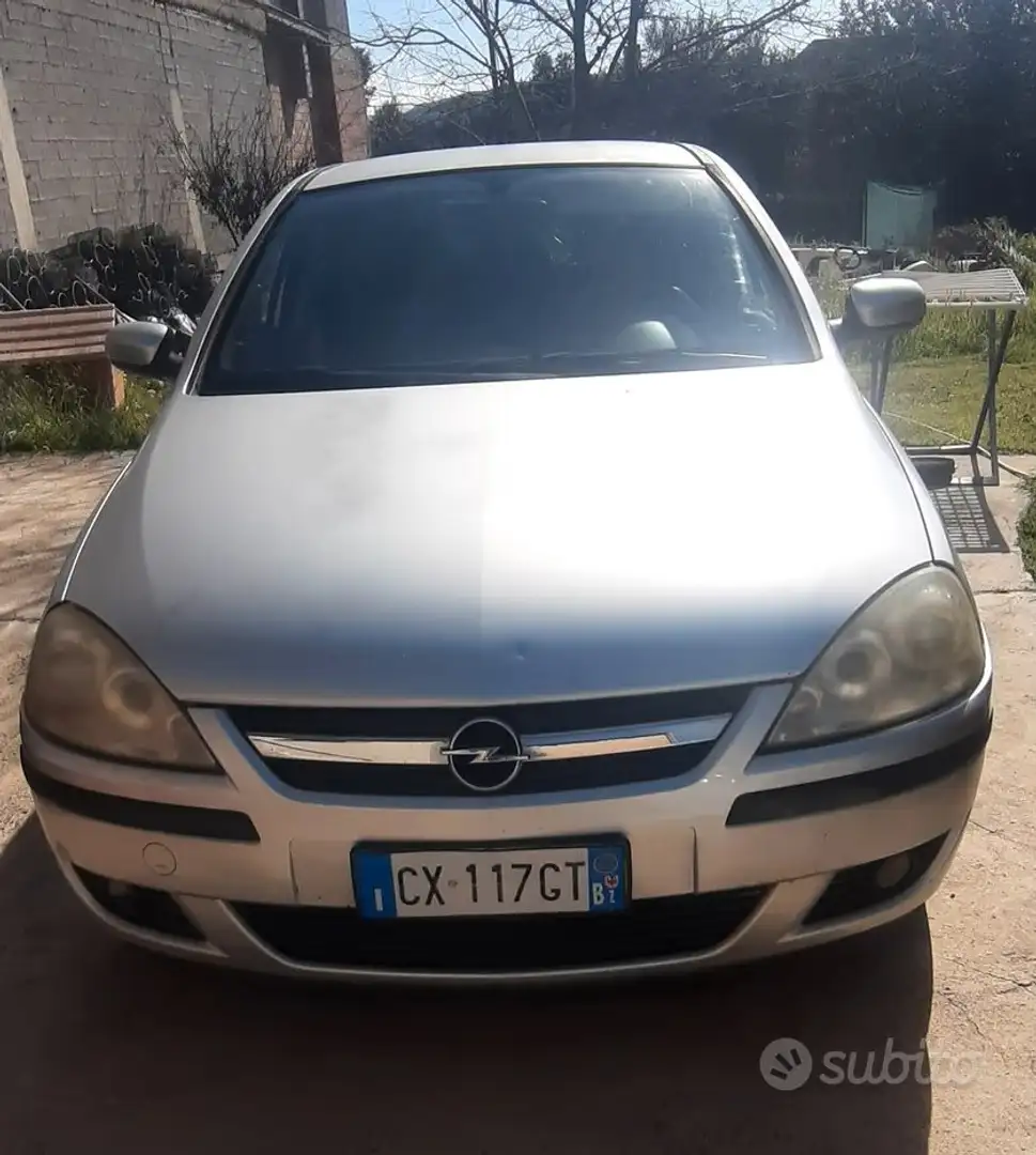 Opel Corsa 5p 1.2 Enjoy Grijs - 1