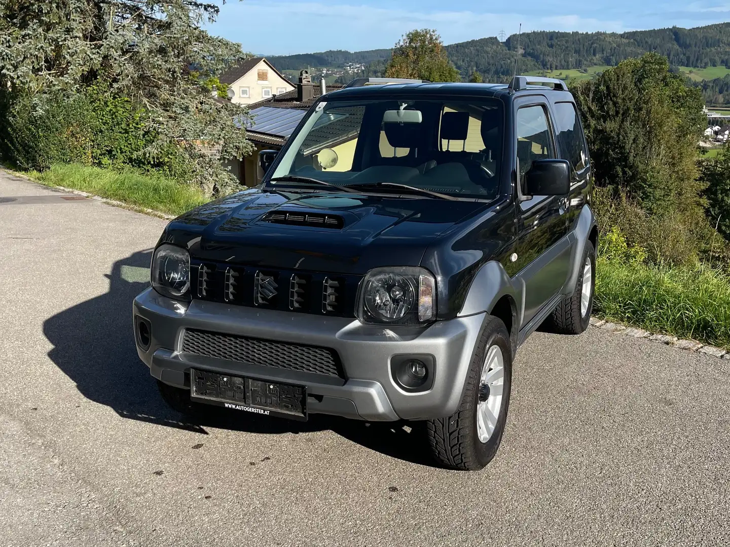 Suzuki Jimny Jimny 1,3 VX Deluxe VX Deluxe Schwarz - 1