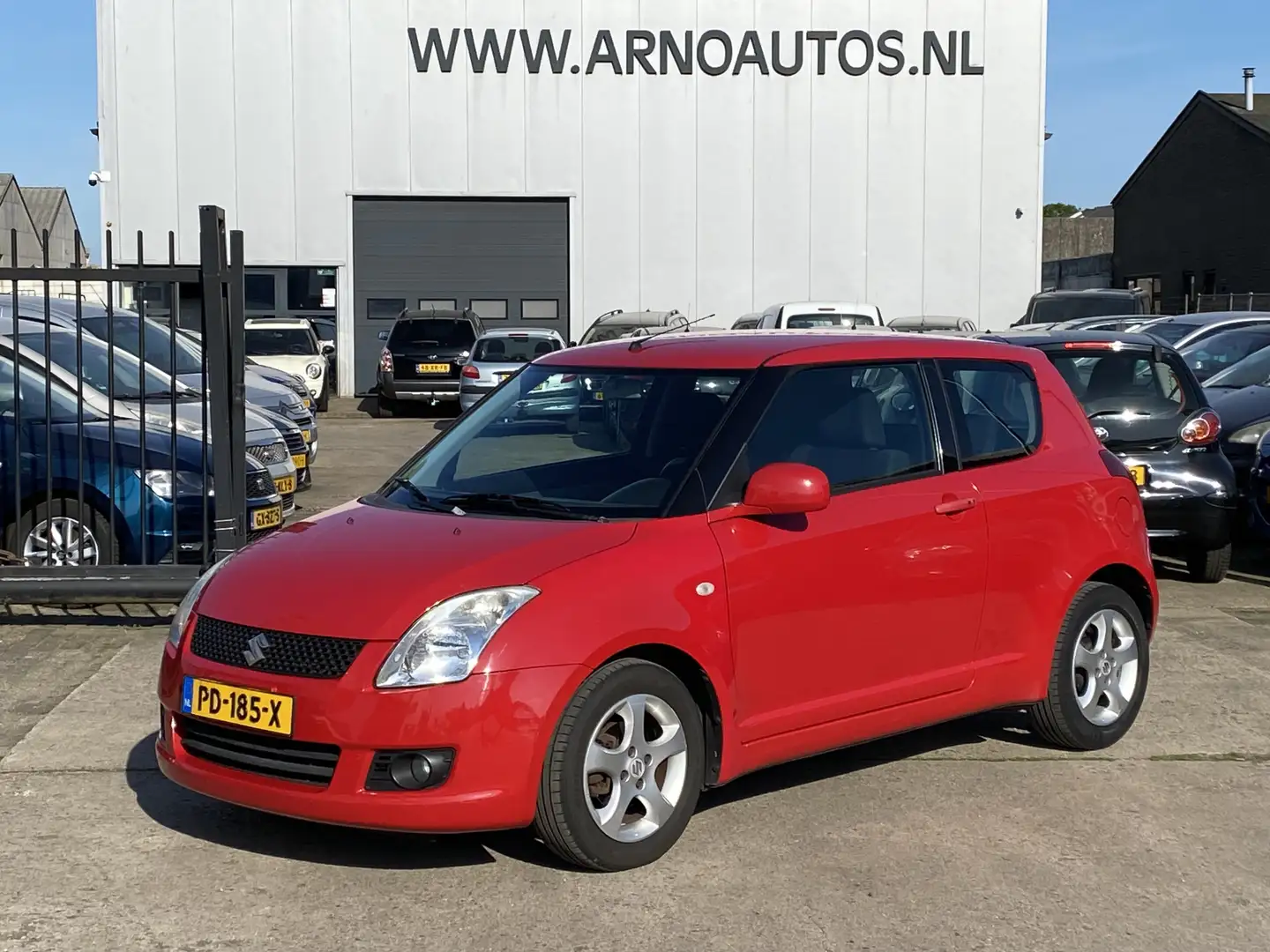 Suzuki Swift 1.3 Comfort, AIRCO, APK TOT 10-05-26, STUURBEKRACH Rood - 1