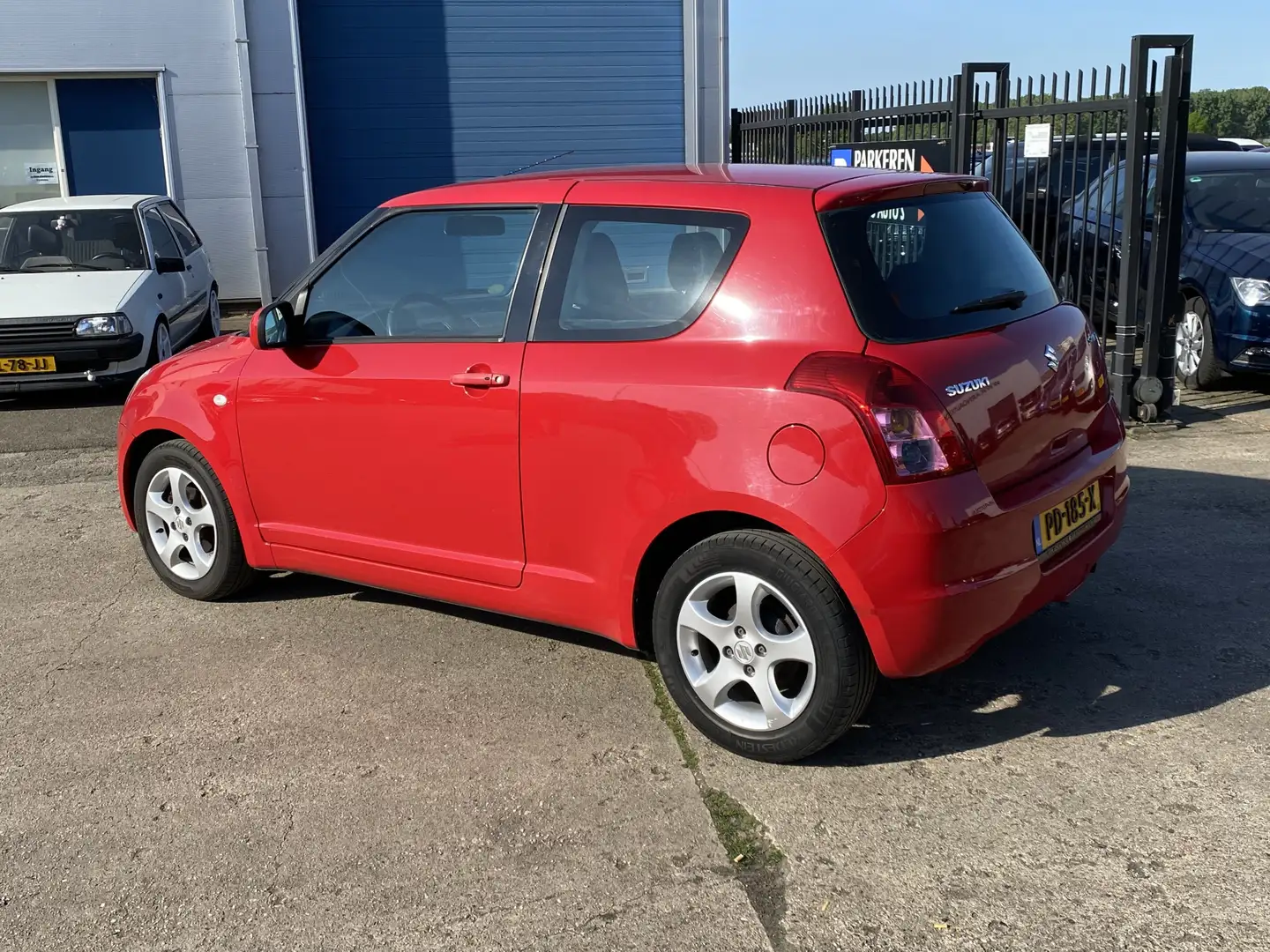 Suzuki Swift 1.3 Comfort, AIRCO, APK TOT 10-05-26, STUURBEKRACH Rood - 2